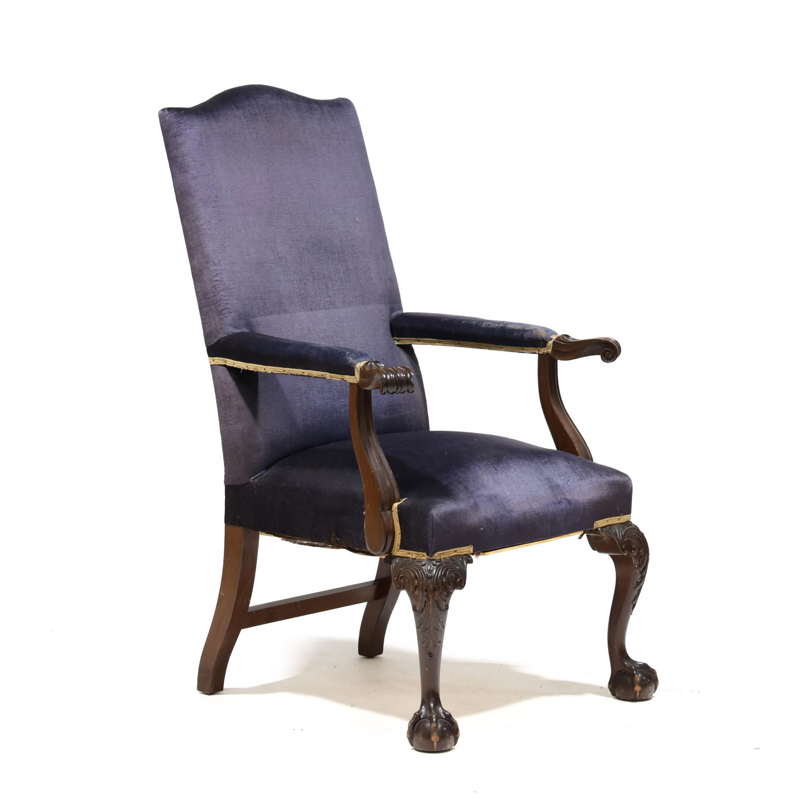 Chippendale Style Carved Mahogany Library Armchair: Chippendale Style Carved Mahogany Library Armchair early 20th century, later blue velvet upholstery, shaped arms, scrolled knuckles, acanthus carved knees on ball and claw feet. 44 x 23 x 23 in. Addit