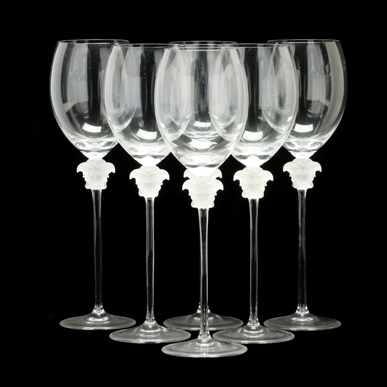 Rosenthal Versace, Six Medusa Lumiere Clear Crystal Wine Stems: Rosenthal Versace, Six Medusa Lumiere Clear Crystal Wine Stemsmade in Germany, designed by Versace, all signed to the underside; together with the original packaging. Stem 11 in.; box 4 1/2 x 5 x 13 5