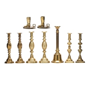 A Collection of Nine Assorted Brass Candlesticks