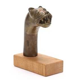 An Indian Brass Lion Head Dagger Hilt