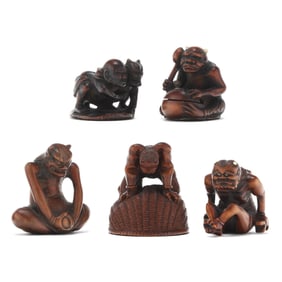 A Group of Five Japanese Carved Boxwood Netsuke of Oni