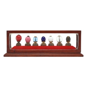 A Collection of Seven Chinese Hat Insignias with Presentation Box