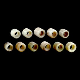 A Group of Eleven Chinese Archer Rings