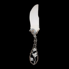 A Sterling Silver and Mixed Metal Pie Server by Stephen Dweck
