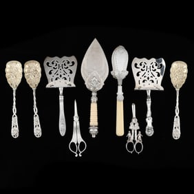 Nine Assorted Silver Flatware Servers