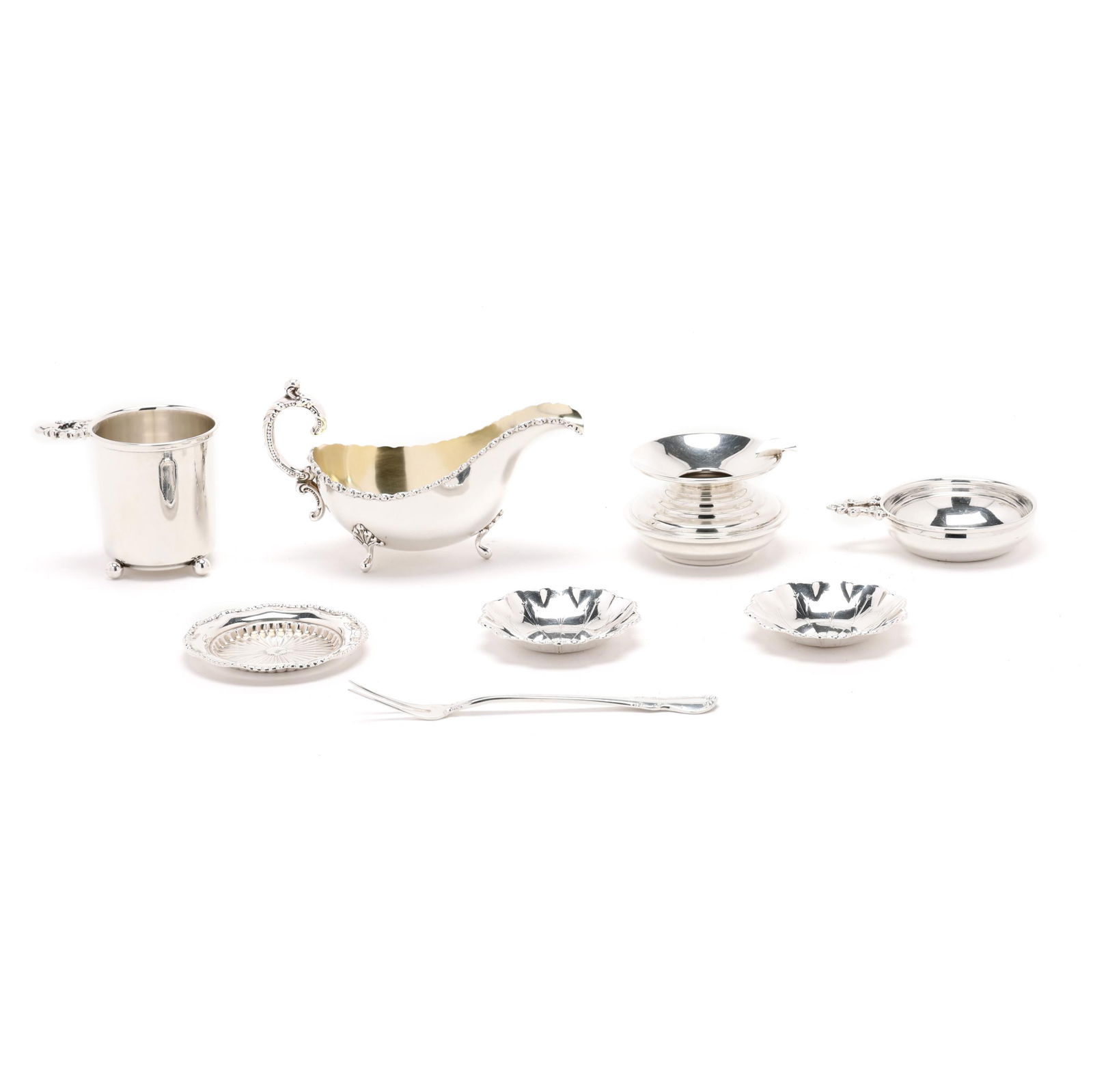 Nine American Sterling Silver Table Accessories: Nine American Sterling Silver Table Accessoriesincludes an International sauceboat; a Boardman oil burner; a baby cup; a baby porringer; a pair of Webster leaf shaped nut dishes; a fluted dish; and a