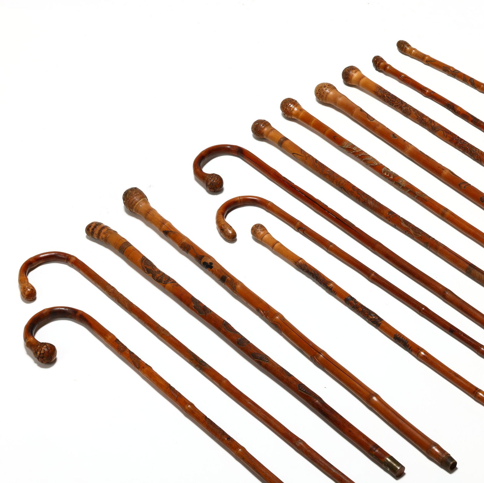 A Collection of (13) Hand Carved Japanese Walking Canes with Inscriptions (1 of 7)