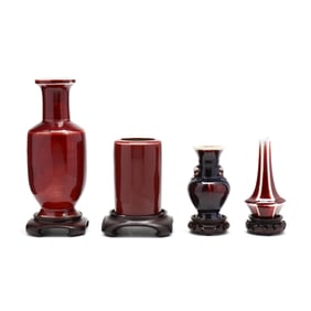 A Collection of Sang de Boeuf Vases with Stands