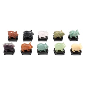 A Set of Asian Hardstone Pigs in Presentation Case