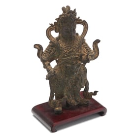 A Chinese Bronze Figure of a Guardian King