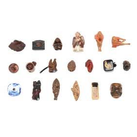 A Large Group of Nineteen Japanese Netsuke and Carvings
