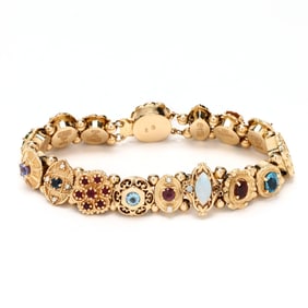 Gold and Gem-Set Slide Charm Bracelet, Richard Glatter