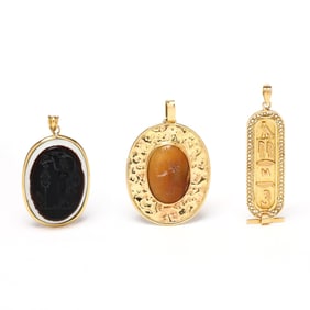 Three Gold Antiquarian Motif Pendants