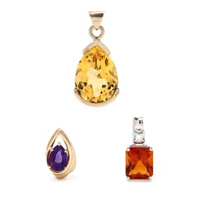 Three Gold and Quartz Pendants