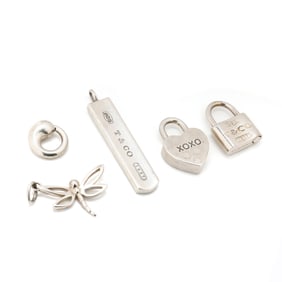 Group of Five Sterling Silver Charms, Tiffany & Co.