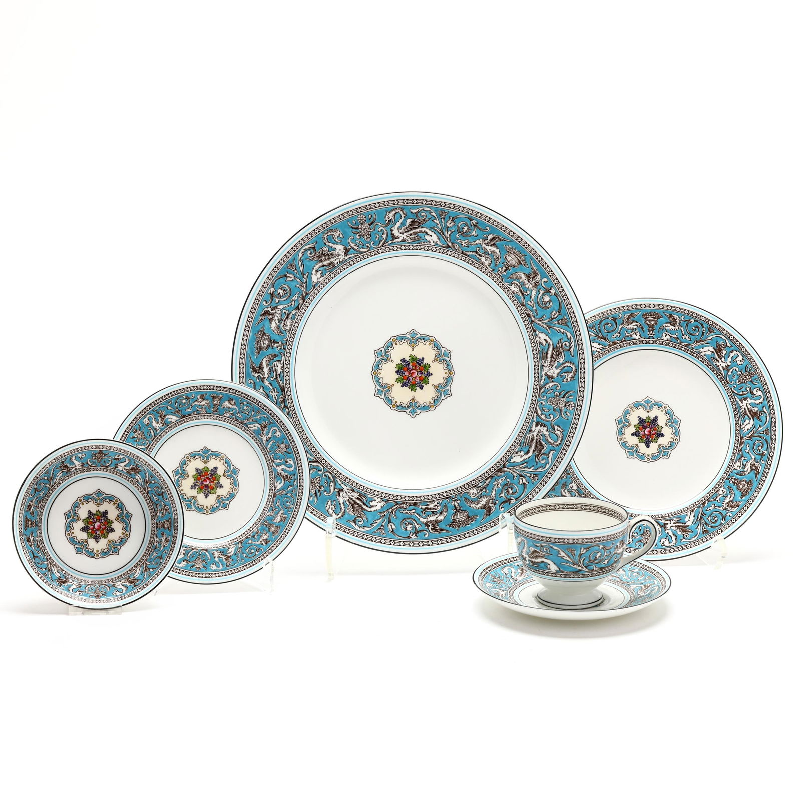 Large Wedgwood Florentine Turquoise China Set: Large Wedgwood Florentine Turquoise China Set(89) pieces, England, late 20th century, each with turquoise rim decorated with griffins and florals to include (10) dinner plates (10 3/4 in.); (10) salad