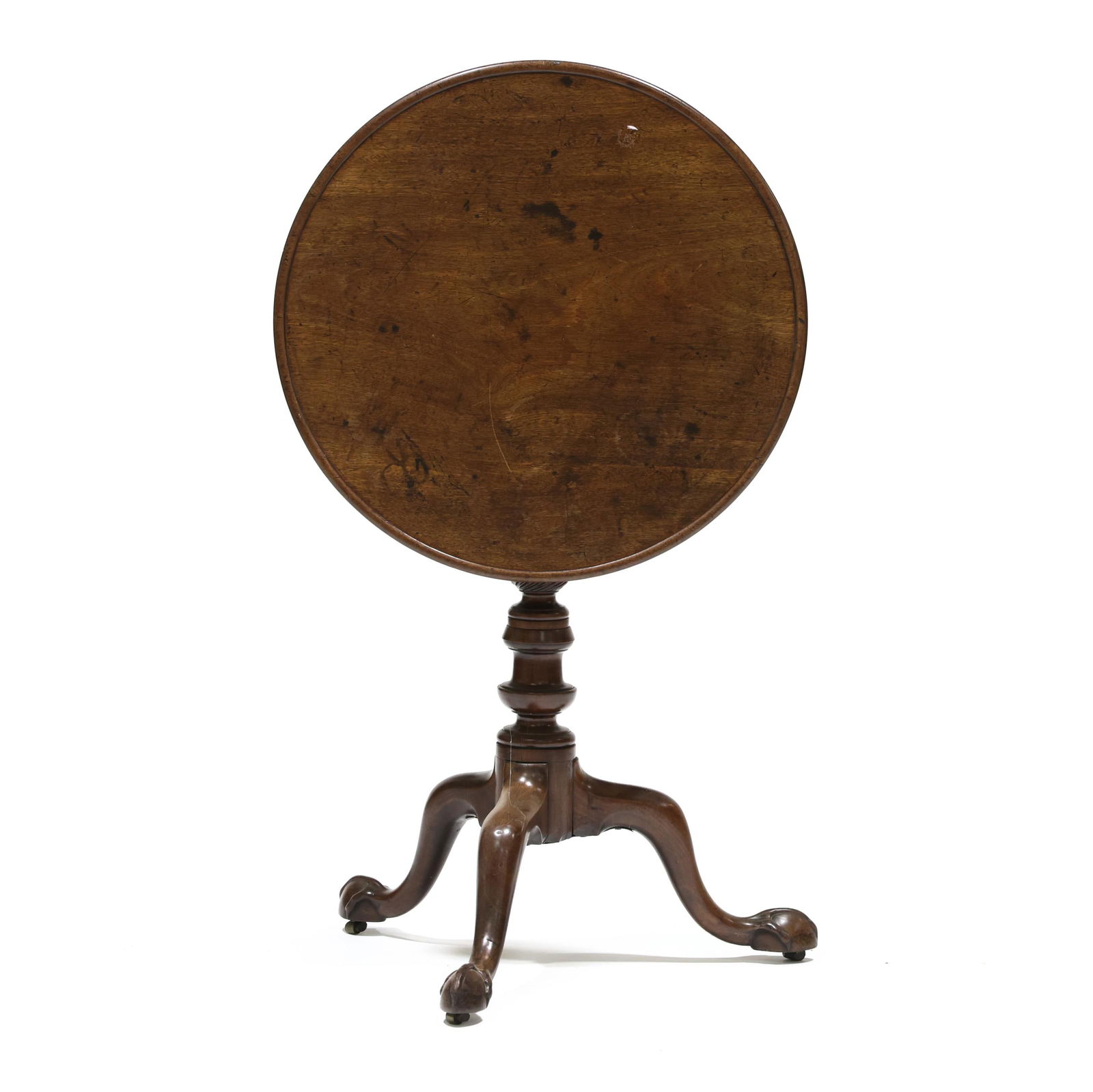 George II Carved Mahogany Tilt Top Tea Table: George II Carved Mahogany Tilt Top Tea Table18th century, circular one board top with molded edge, block and batten support, spiral twist urn and ring turned standard, tripod base with ball and claw f