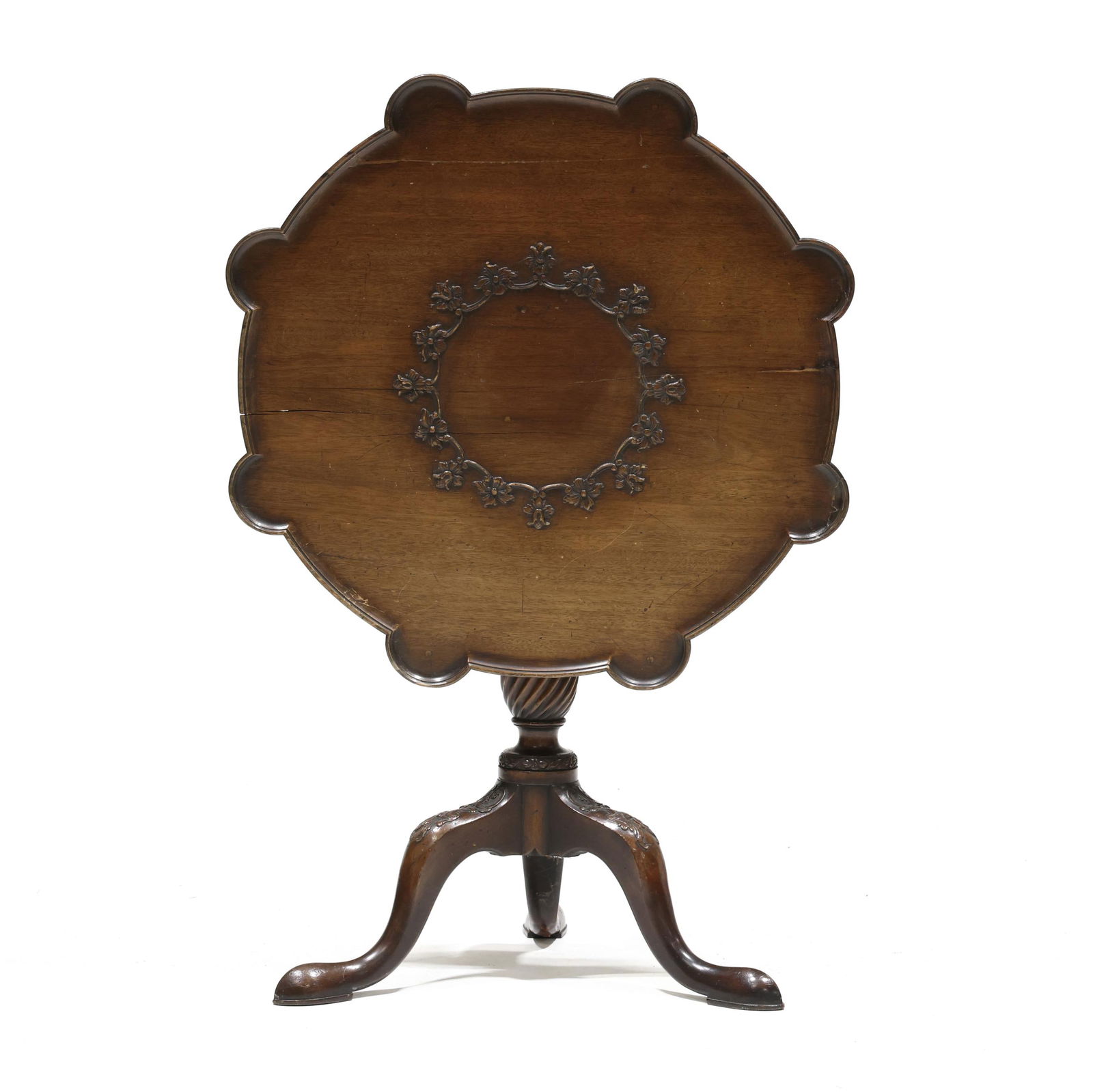 Irish Queen Anne Style Carved Mahogany Tilt Top Tea Table: Irish Queen Anne Style Carved Mahogany Tilt Top Tea Tableearly 20th century, shaped top with molded edge and central relief carved rosette ring, batten and block support, spiral twist urn standard, tr