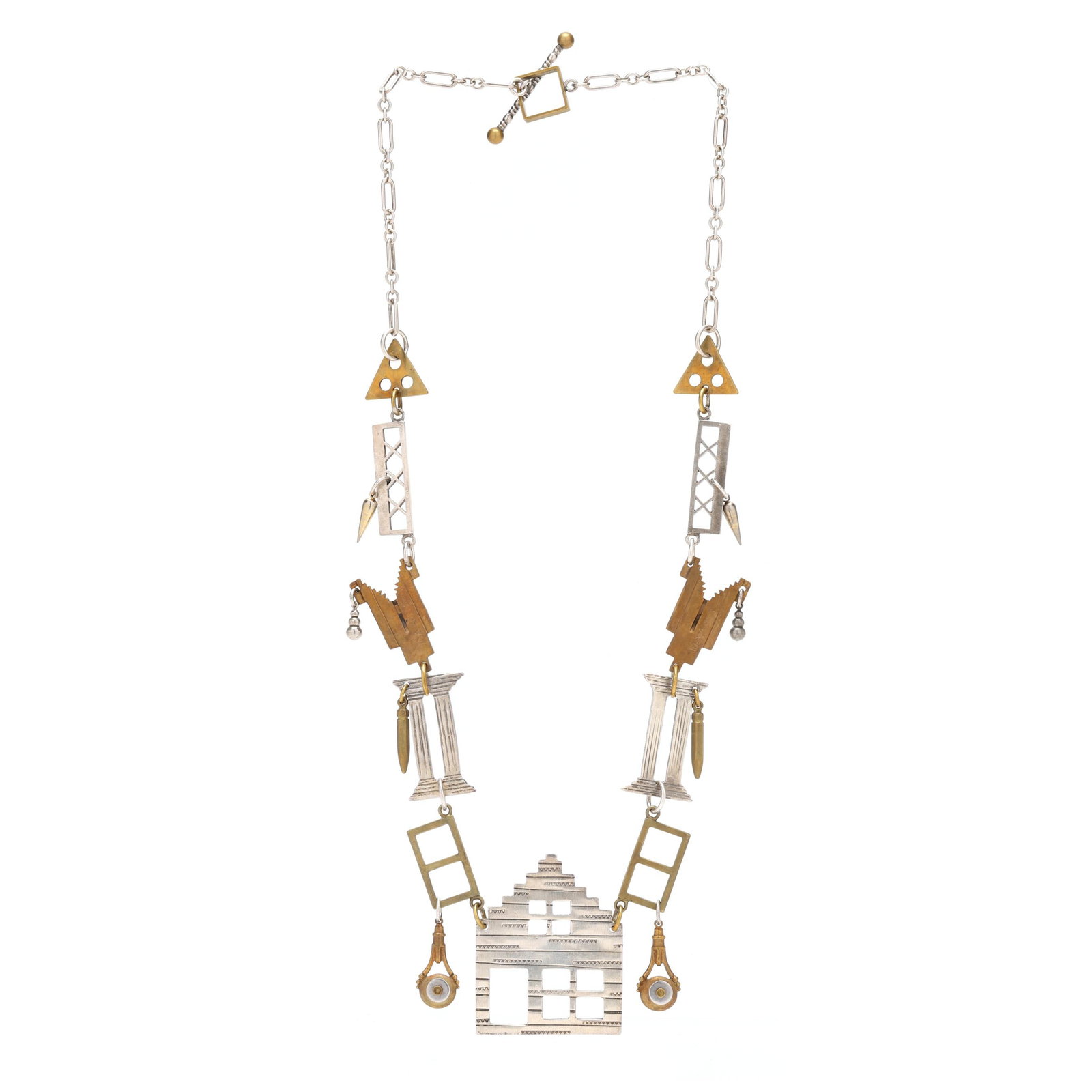 Silver and Brass Techno-Romantic Necklace, Thomas Mann: Silver and Brass Techno-Romantic Necklace, Thomas Manncirca 1990, the silver necklace including geometric, column, and house links, suspending multiple dangles, completed with a toggle clasp, house an