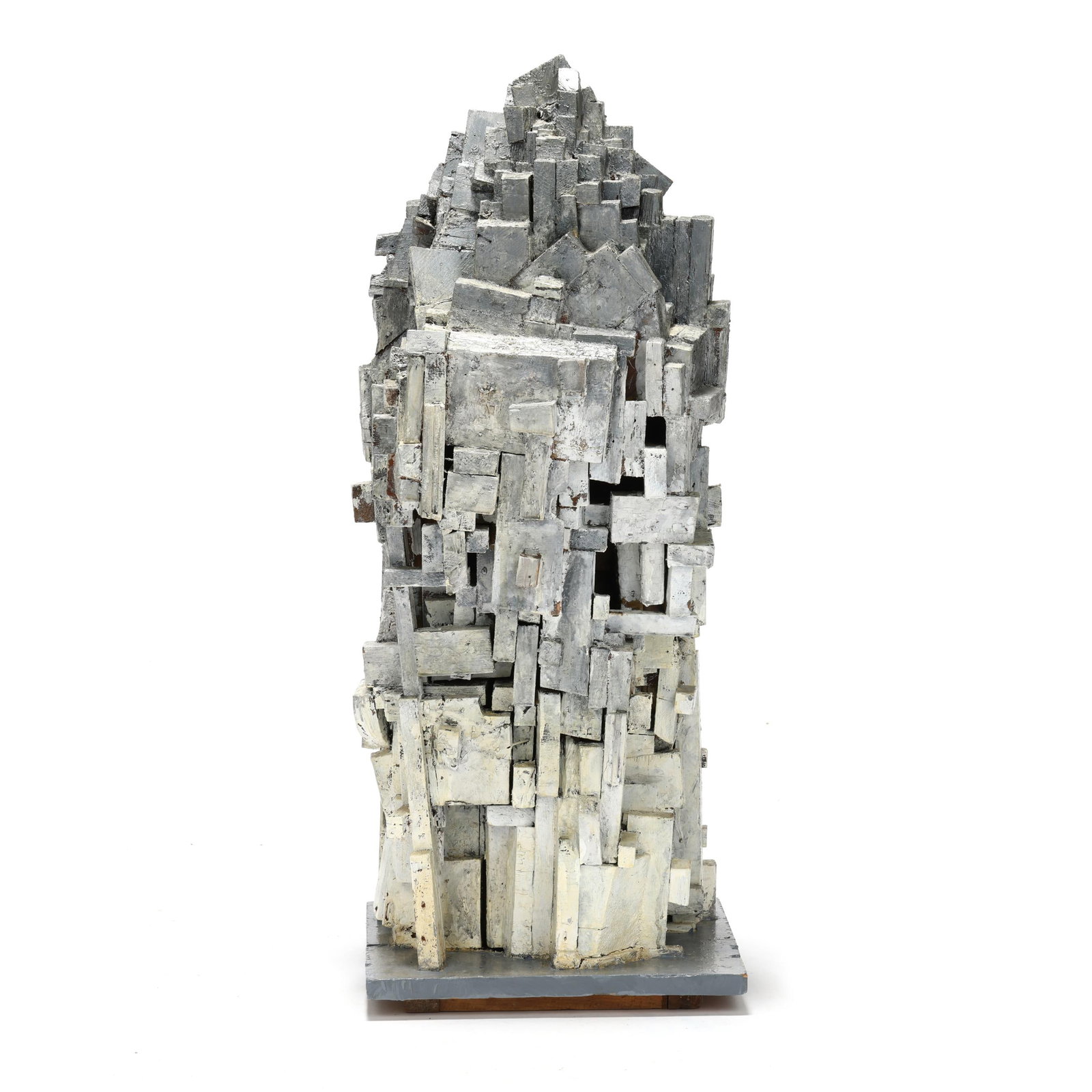James P. Clark (American, 1923-2015), Empire State: James P. Clark (American, 1923-2015), Empire State1965, cubist wood assemblage painted in a gradated white/gray, pencil signed, dated and titled to the underside. 36 1/2 x 14 x 13 1/2 in. Born in Conn