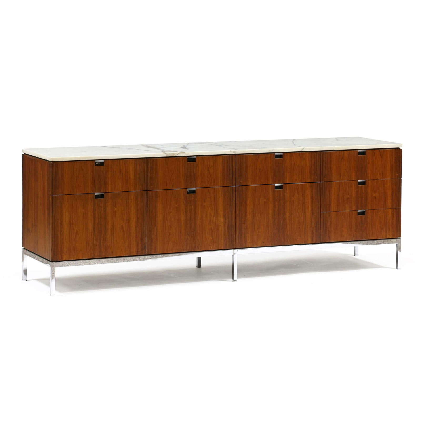 Florence Knoll (American, 1917-2019), Marble Top Rosewood Dresser: Florence Knoll (American, 1917-2019), Marble Top Rosewood Dressercirca 1960, white marble top, rosewood veneered case with nine drawers with chrome lip pulls, six leg polished steel base, appears unma