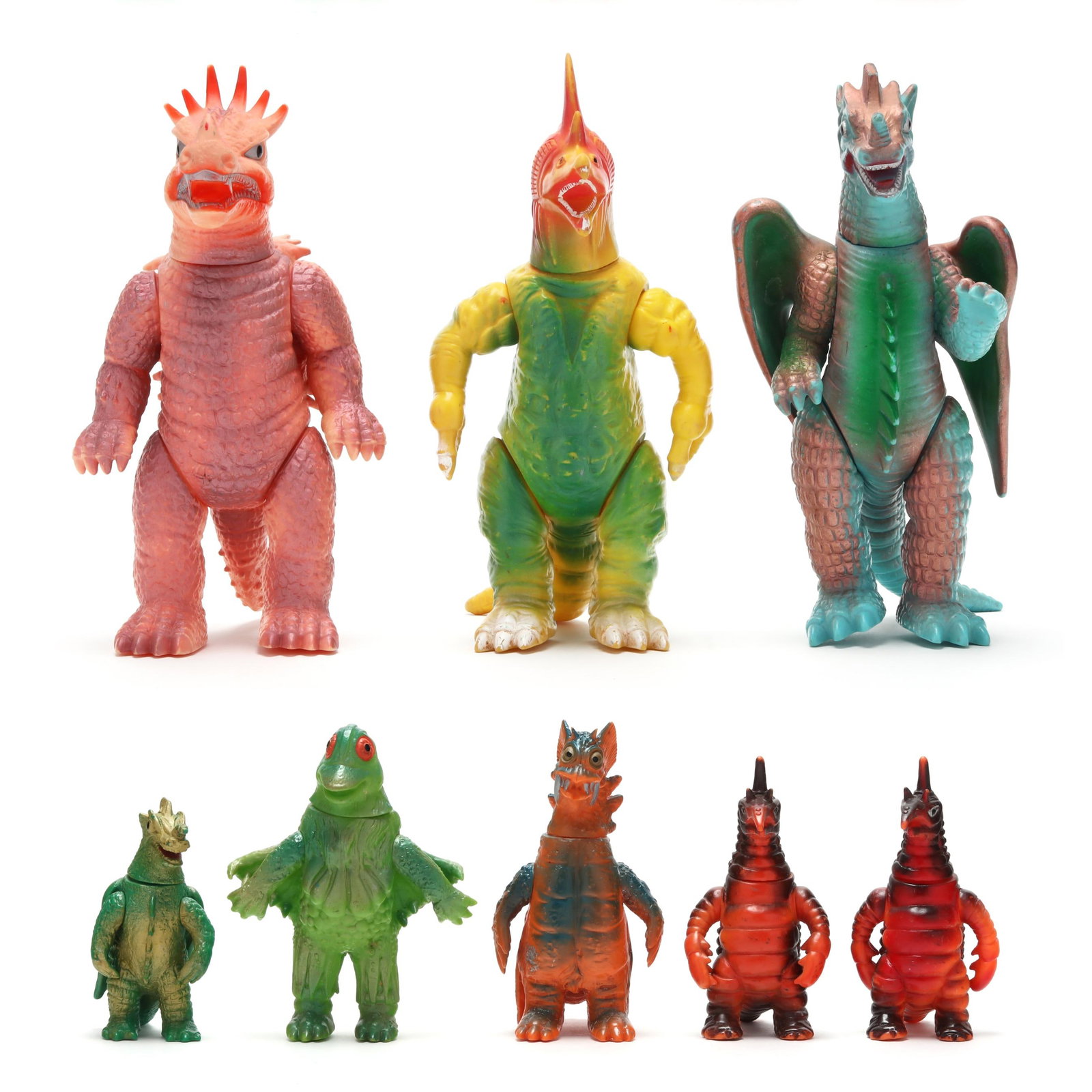 Eight Vintage Japanese Kaiju Monster Figures, Including Bullmark: Eight Vintage Japanese Kaiju Monster Figures, Including Bullmarkcirca 1970s, (8) colored soft vinyl (sofubi) monster figures, several from the Ultraman franchise, the three larger figures include: a M