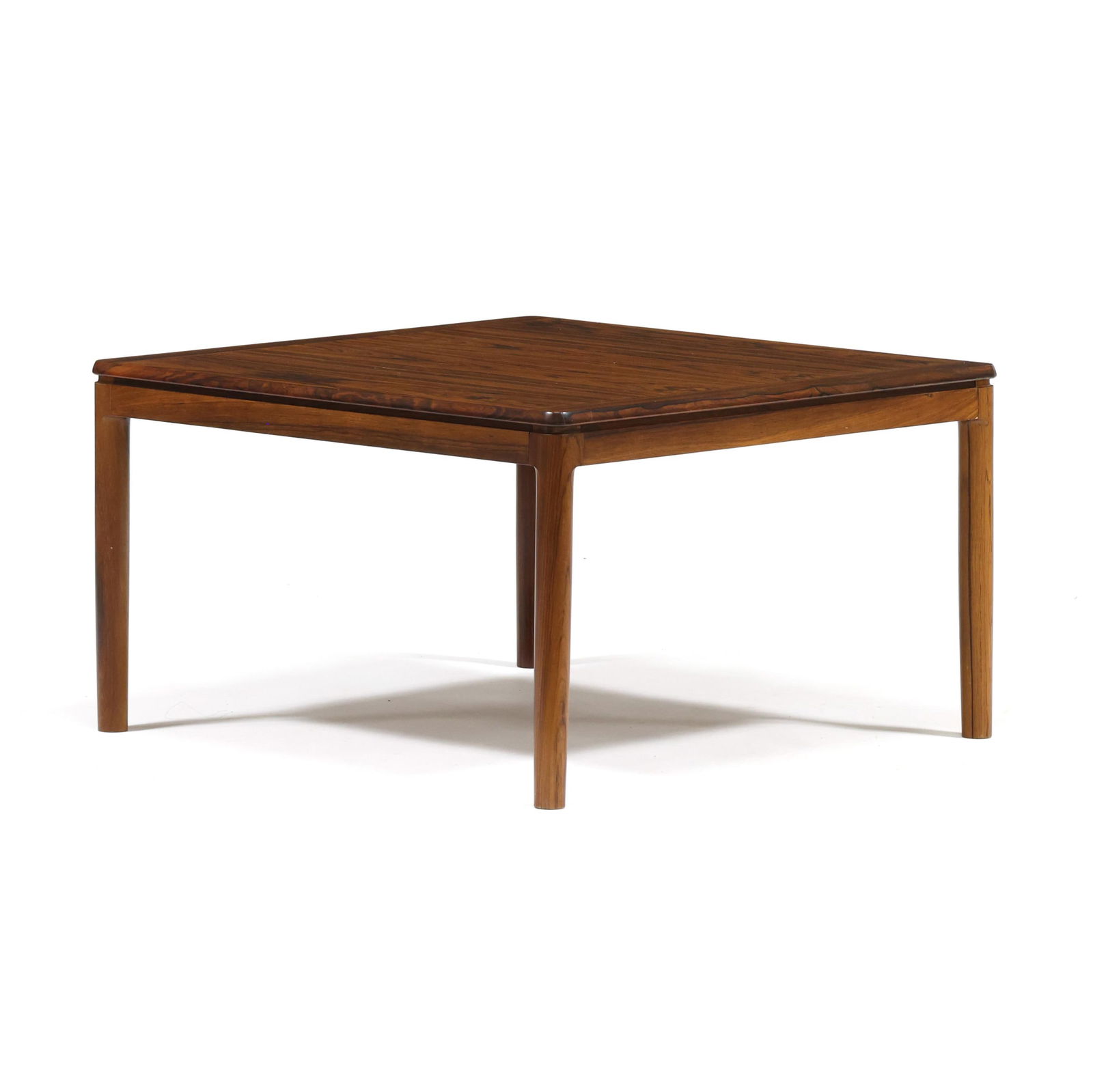 Danish Rosewood Occasional Table: Danish Rosewood Occasional Table circa 1960, rosewood veneer, square top with banded edge, molded skirt, rounded legs, appears unmarked. 17 x 29.25 x 29.25 in. Additional high-resolution photos