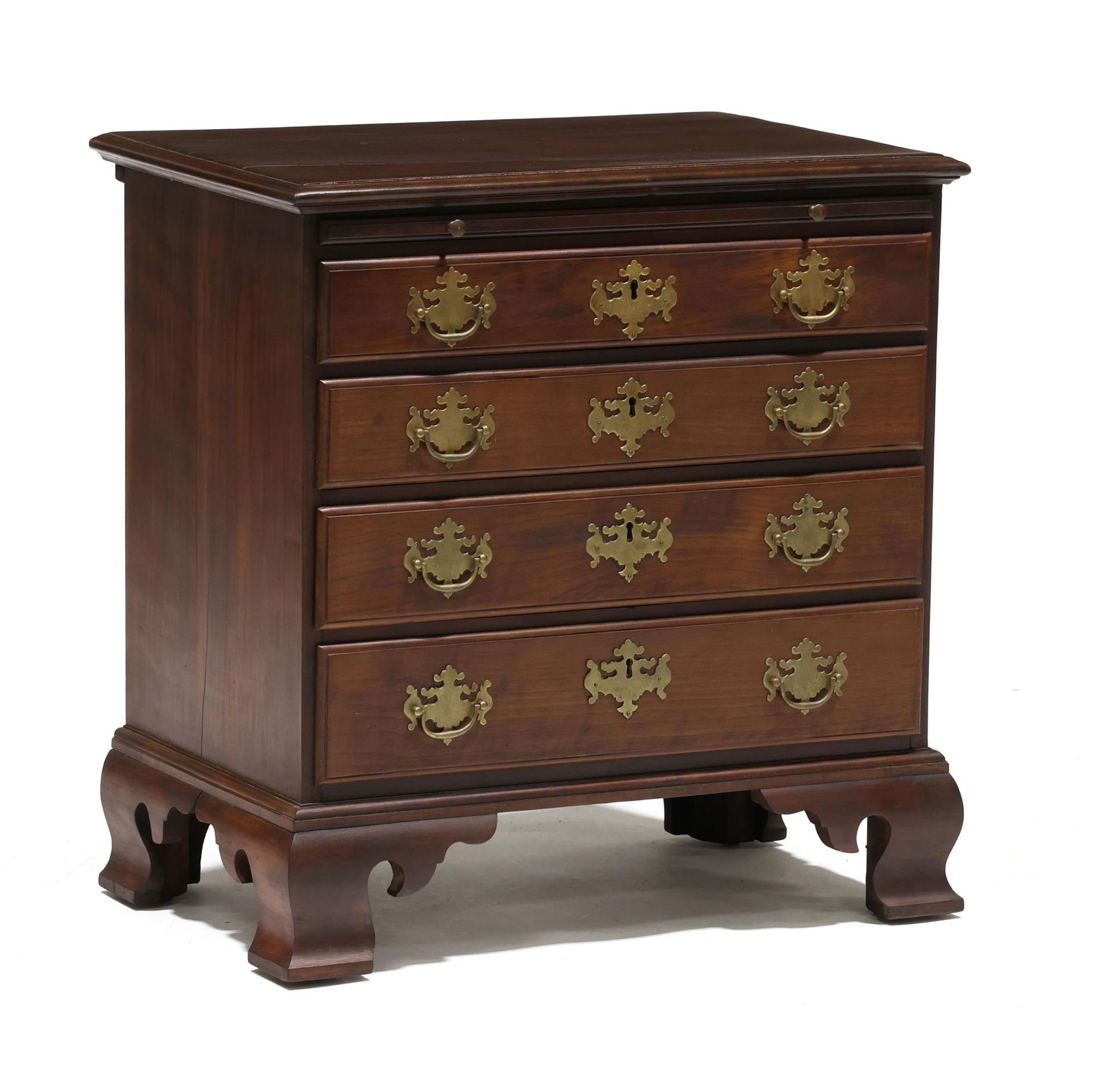 Bench Made Chippendale Style Cherry Bachelor's Chest of Drawers: Bench Made Chippendale Style Cherry Bachelor's Chest of Drawersearly to mid-20th century, poplar secondary, dovetailed case, top with applied molded edge, dressing slide over four graduated lipped dra
