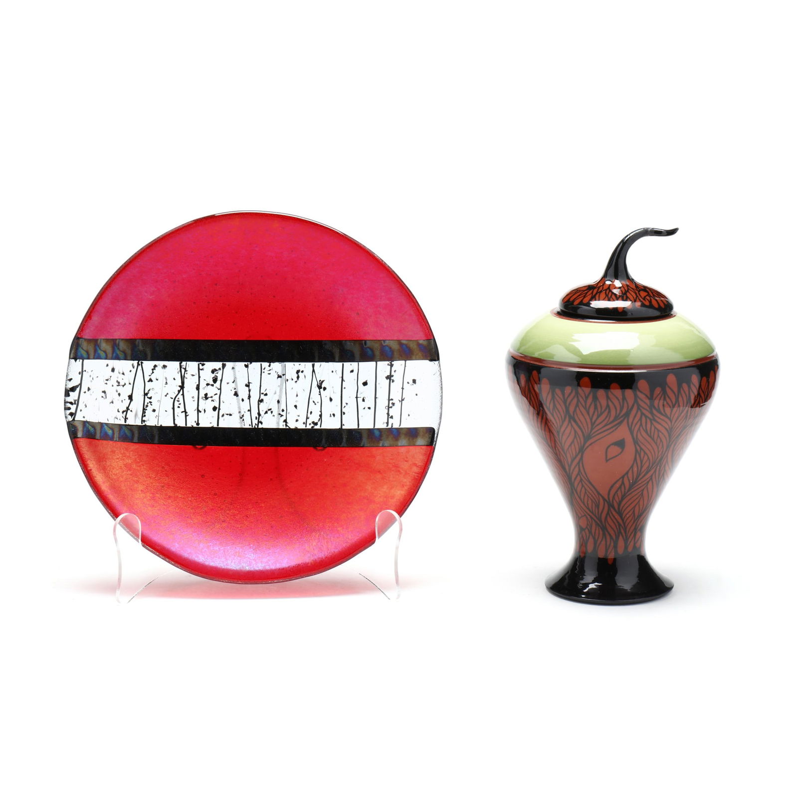 Studio Glass Dish and Lidded Ceramic Vessel, Signed: Studio Glass Dish and Lidded Ceramic Vessel, Signedincluding a lidded ceramic jar with peacock feather motif glaze decoration signed by Marti Mocahbee (9 in.); and a fused glass dish with illegible si