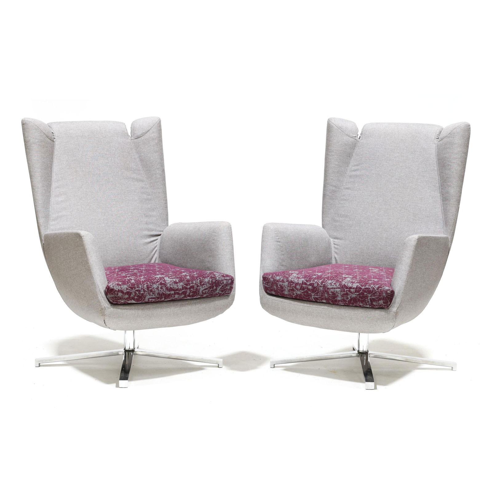 Pair of Contemporary Swivel Lounge Chairs: Pair of Contemporary Swivel Lounge Chairsunknown maker, grey upholstery with zipper seams, Velcro purple geometric seat cushion, brushed steel swivel base. 42 x 27 x 25 in. Additional high-resolution
