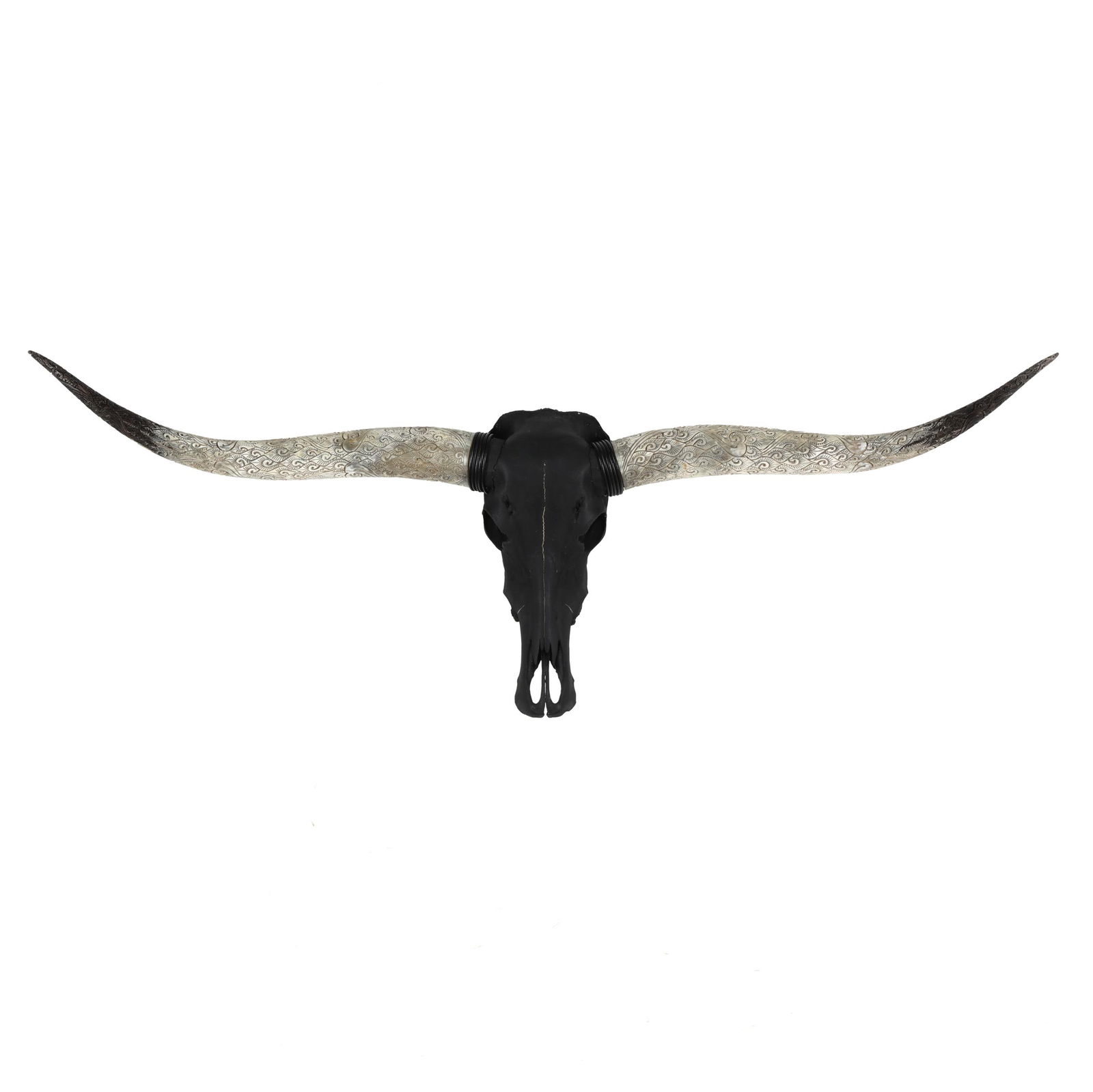 Custom Carved Horn Taxidermy Bull Skull: Custom Carved Horn Taxidermy Bull Skull20th century, black-painted natural skull and reeded horn mounts, the horns carved with stylized foliate and scrolled patterns and painted at the distal ends, to