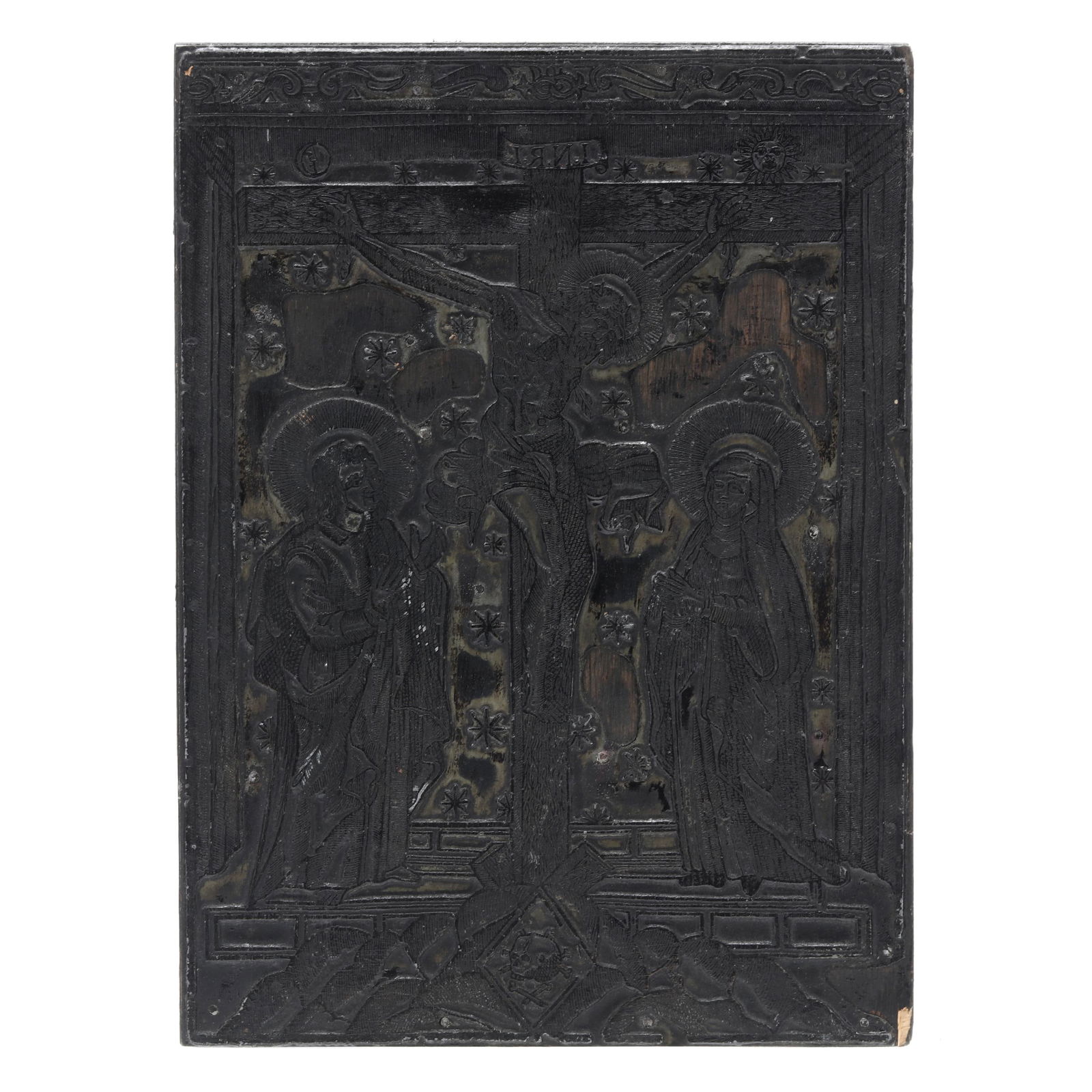Metalcut Printing Block Depicting the Crucifixion: Metalcut Printing Block Depicting the Crucifixionlikely German, printing block made from metalcut mounted to later wood, depicting Christ on the cross between the Virgin Mary and St. John, no signatur