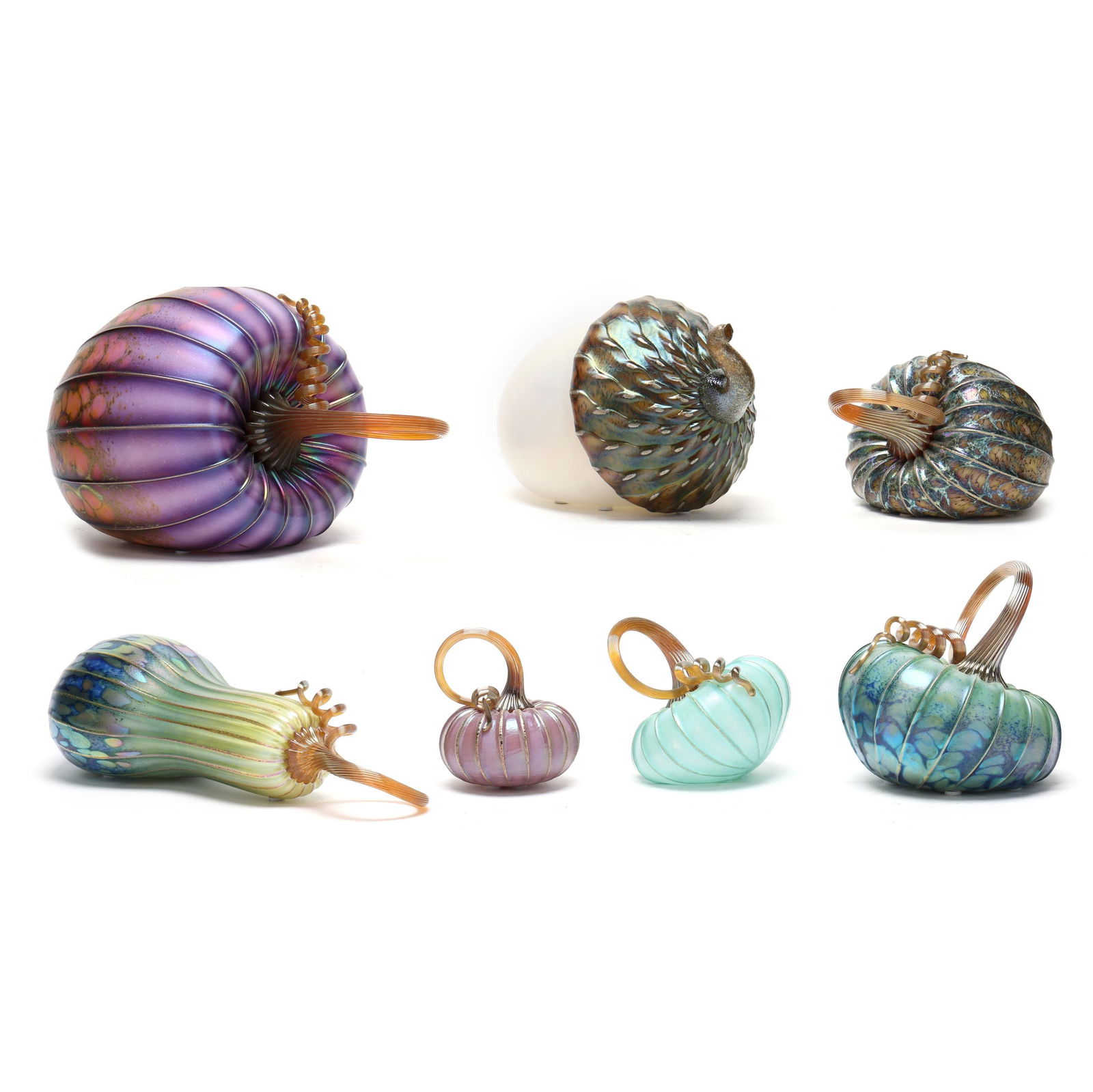 Jack Pine (American, b. 1965), Five Art Glass Pumpkins, Gourd and Acorn: Jack Pine (American, b. 1965), Five Art Glass Pumpkins, Gourd and Acorncirca 2018, multi-color blown iridescent glass with applied stems, some pieces are signed. Purple pumpkin: 8 x 8 x 12 in.; acorn: