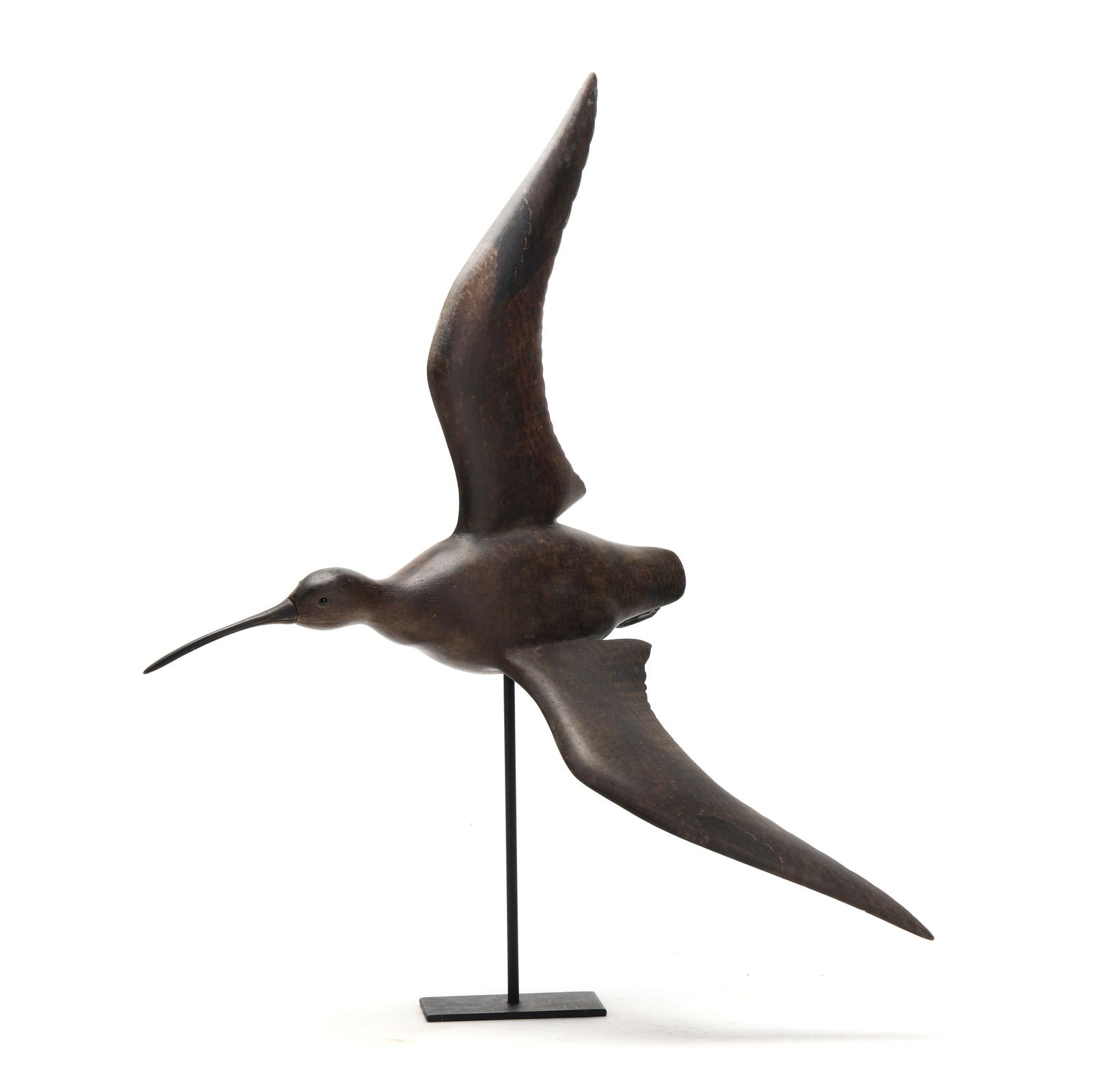 Frank Finney (VA, b. 1947), Flying Curlew: Frank Finney (VA, b. 1947), Flying CurlewCape Charles, Virginia, circa 2000, carved and painted wood, glass eyes, bill and feet are carved bone, incised FF, custom stand conveys. Length 20 in. Active