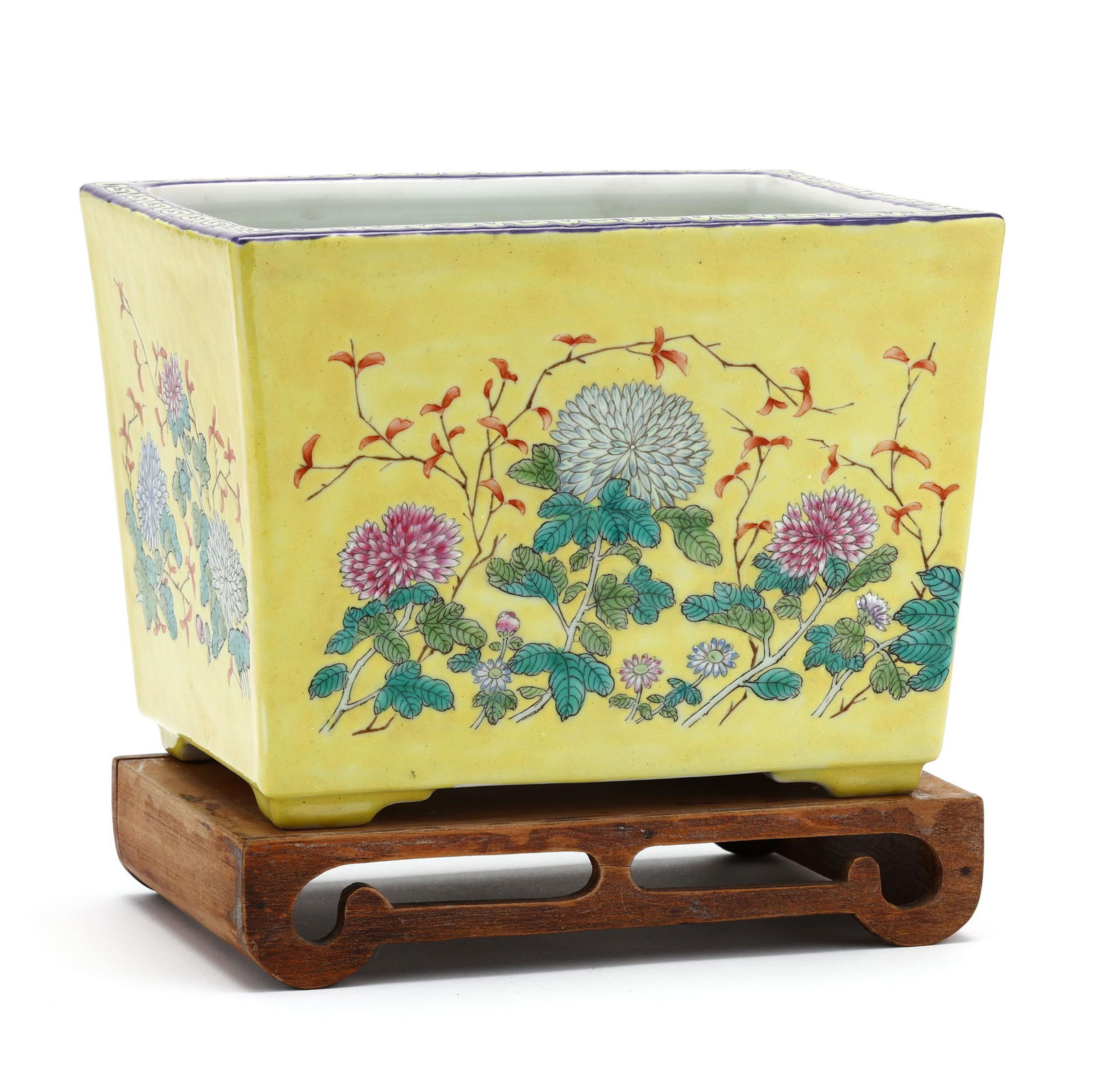 A Chinese Yellow Ground Porcelain Jardiniere with Chrysanthemums: A Chinese Yellow Ground Porcelain Jardiniere with ChrysanthemumsGuangxu period (1875-1908), rectangular in shape, yellow ground glazed porcelain hand-painted with a garden of blooming chrysanthemums,