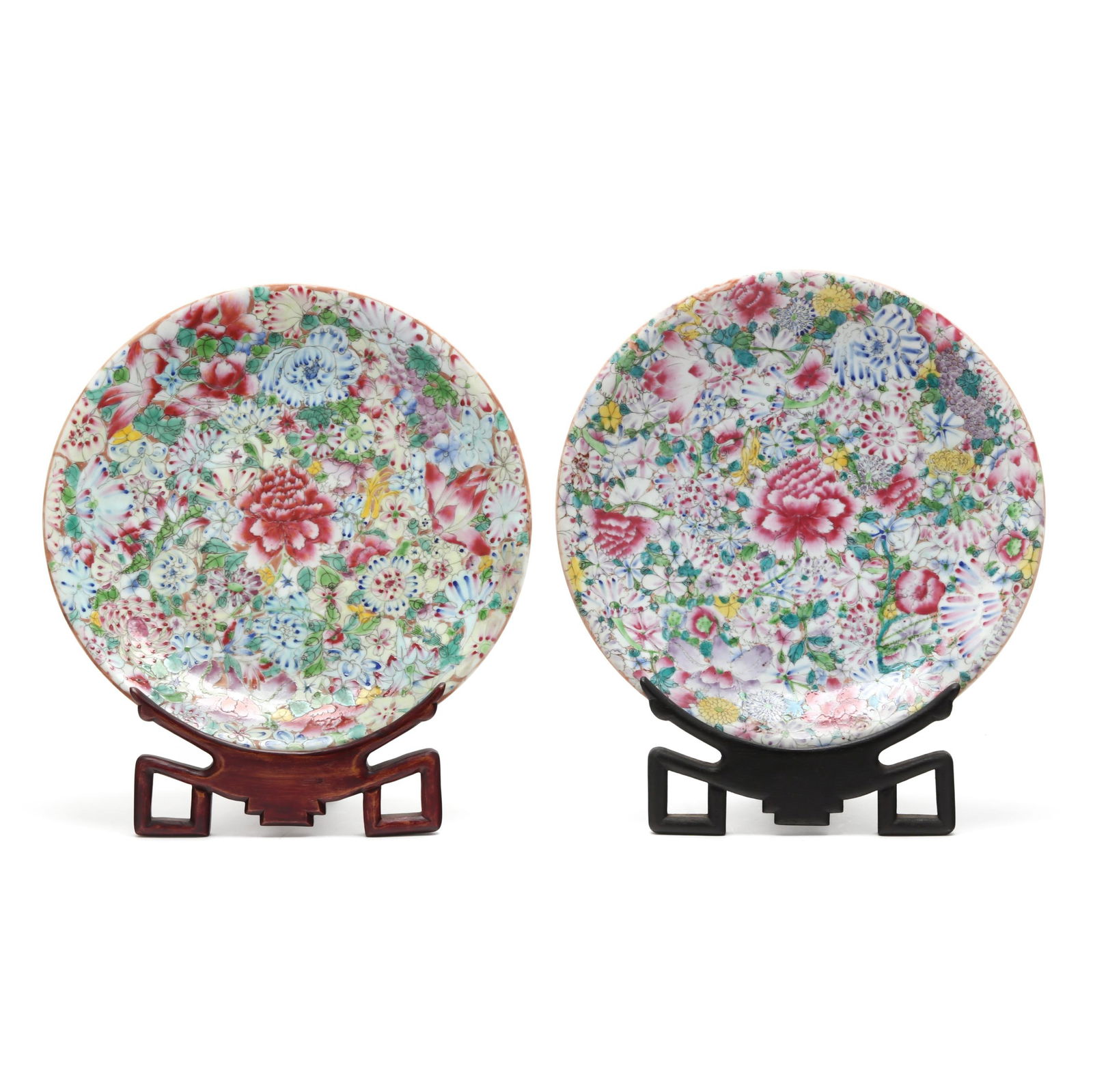 A Matched Pair of Large Chinese Millefleurs Porcelain Chargers: A Matched Pair of Large Chinese Millefleurs Porcelain ChargersRepublic period (1912-1949), large porcelain chargers hand painted in polychrome enamels and gilt with a myriad of lush flora, each with a