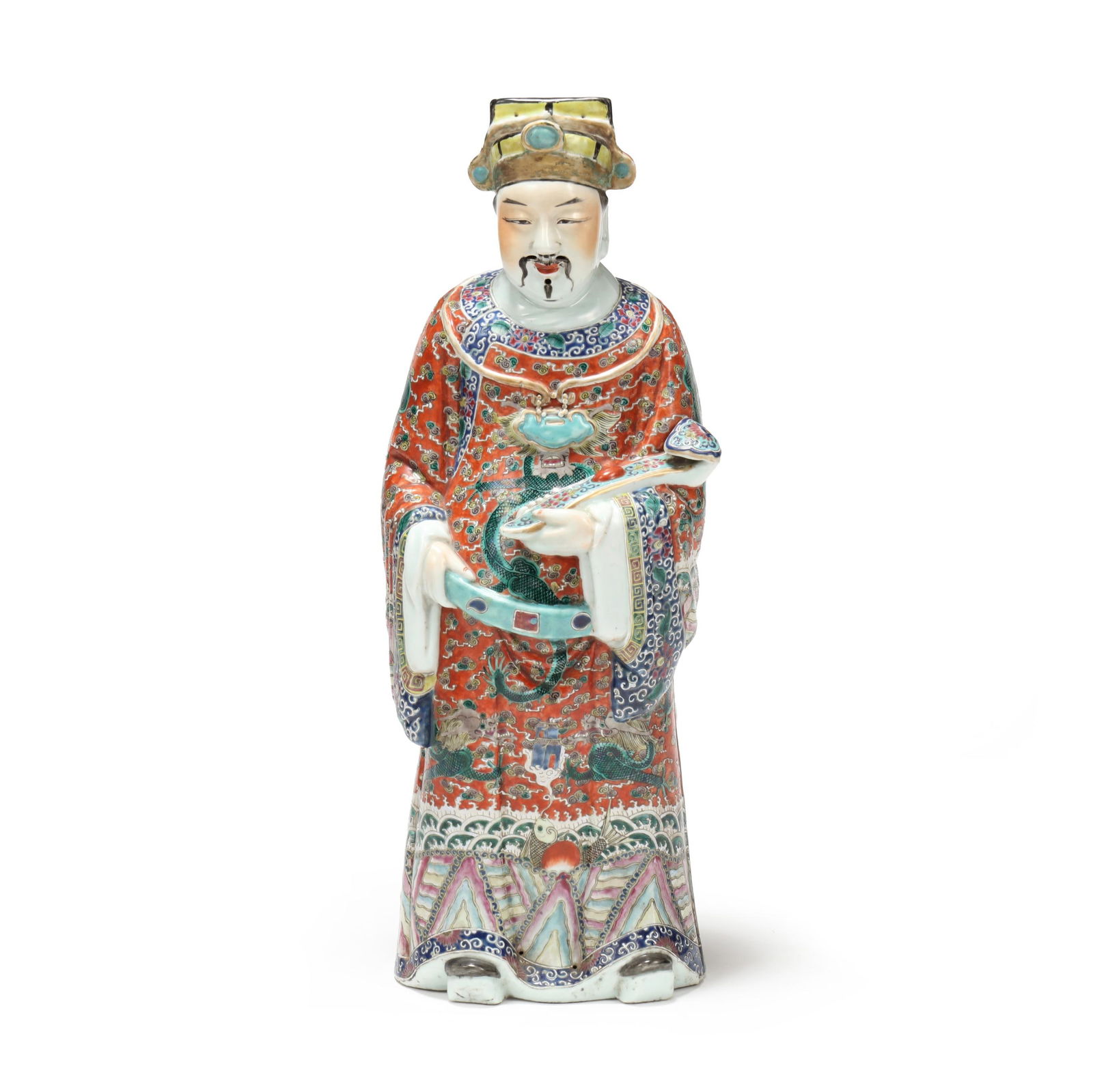 A Large Chinese Porcelain Famille Rose Figure of an Immortal: A Large Chinese Porcelain Famille Rose Figure of an Immortal Republic period (1912-1949), a porcelain standing figure hand-painted in vibrant famille rose palette, he holds a ruyi scepter and wears ro