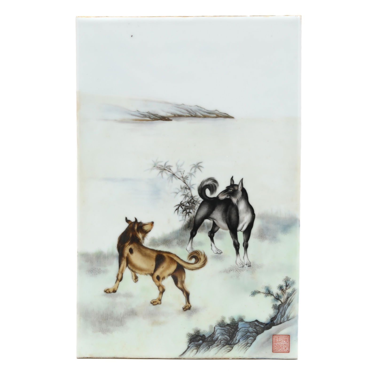 A Chinese Famille Rose Porcelain Plaque with Dogs: A Chinese Famille Rose Porcelain Plaque with DogsRepublic period (1912-1949), porcelain hand-painted in polychrome enamels with two dogs standing in a lush landscape with bamboo and rocks, a red four