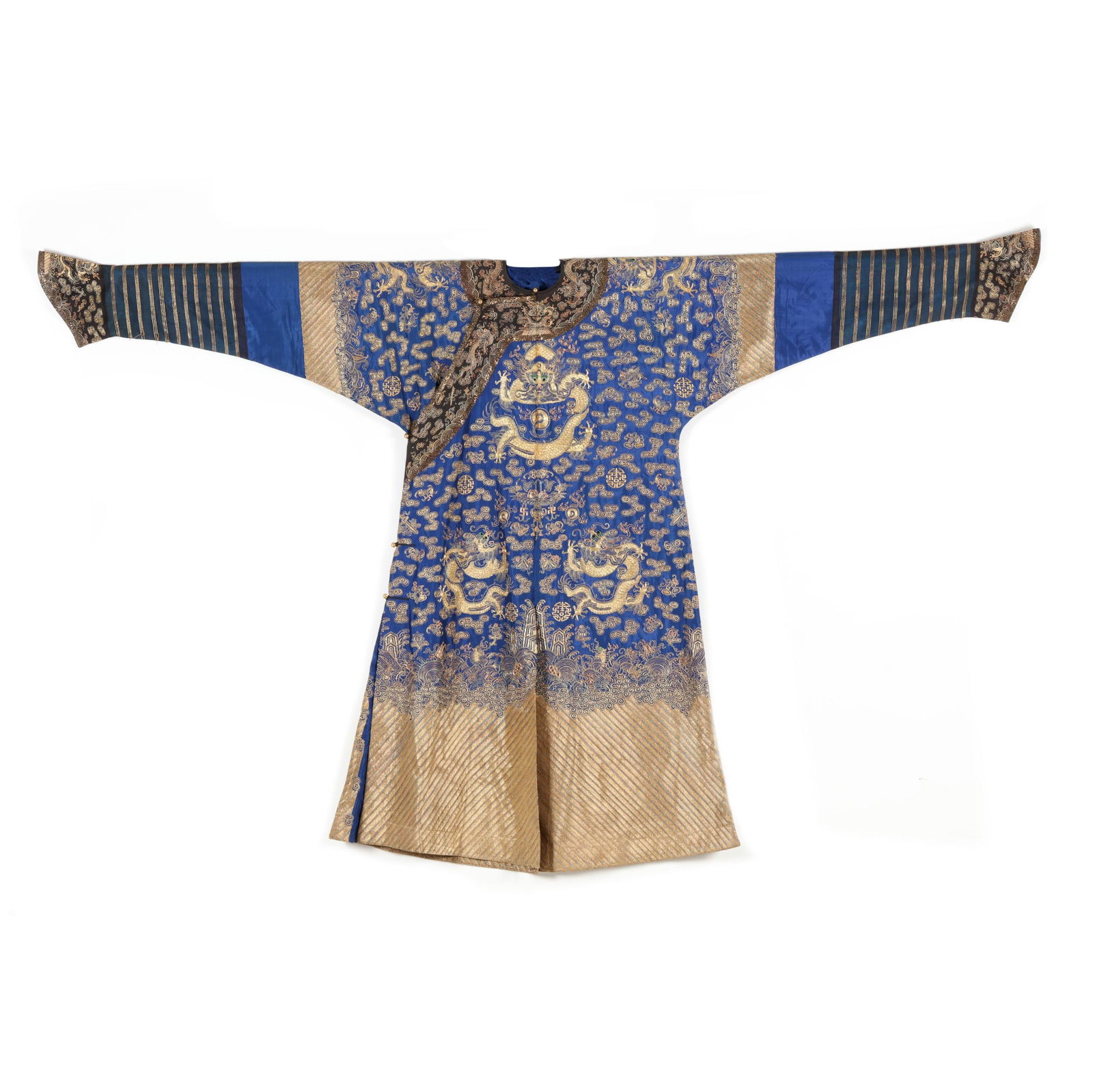 A Chinese Blue Ground Gold Embroidered Dragon Court Robe: A Chinese Blue Ground Gold Embroidered Dragon Court RobeQing dynasty (1644-1912), late 19th century or early 20th century, blue ground silk jifu, finely embroidered in mostly metallic gold wrapped sil