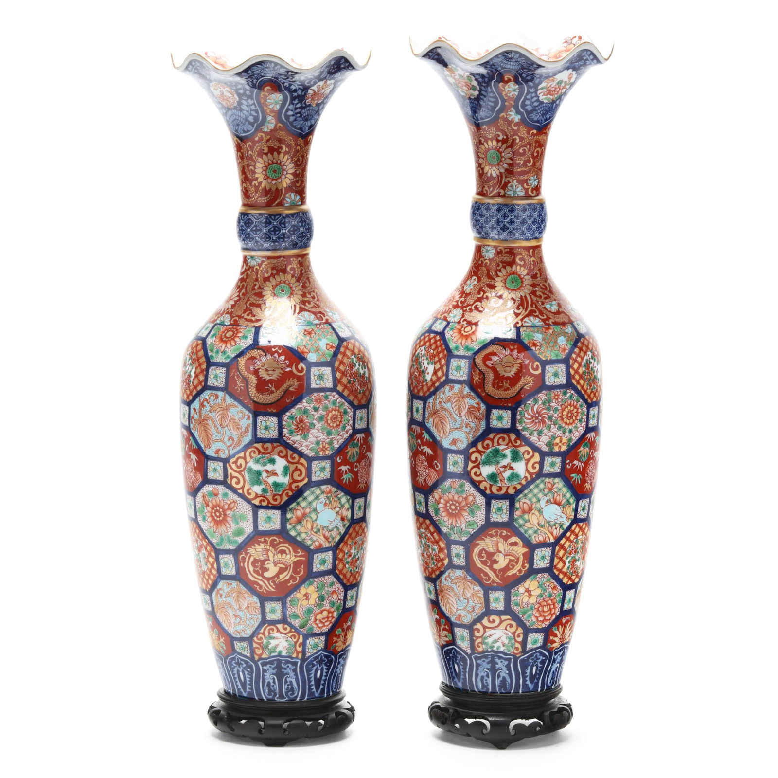 A Pair of Japanese Porcelain Imari Mantle Vases: A Pair of Japanese Porcelain Imari Mantle Vases Meiji period (1868-1912), hand-painted and gilt tapered vases with flared and fluted rim and banded neck, each with patchwork decoration to body featuri