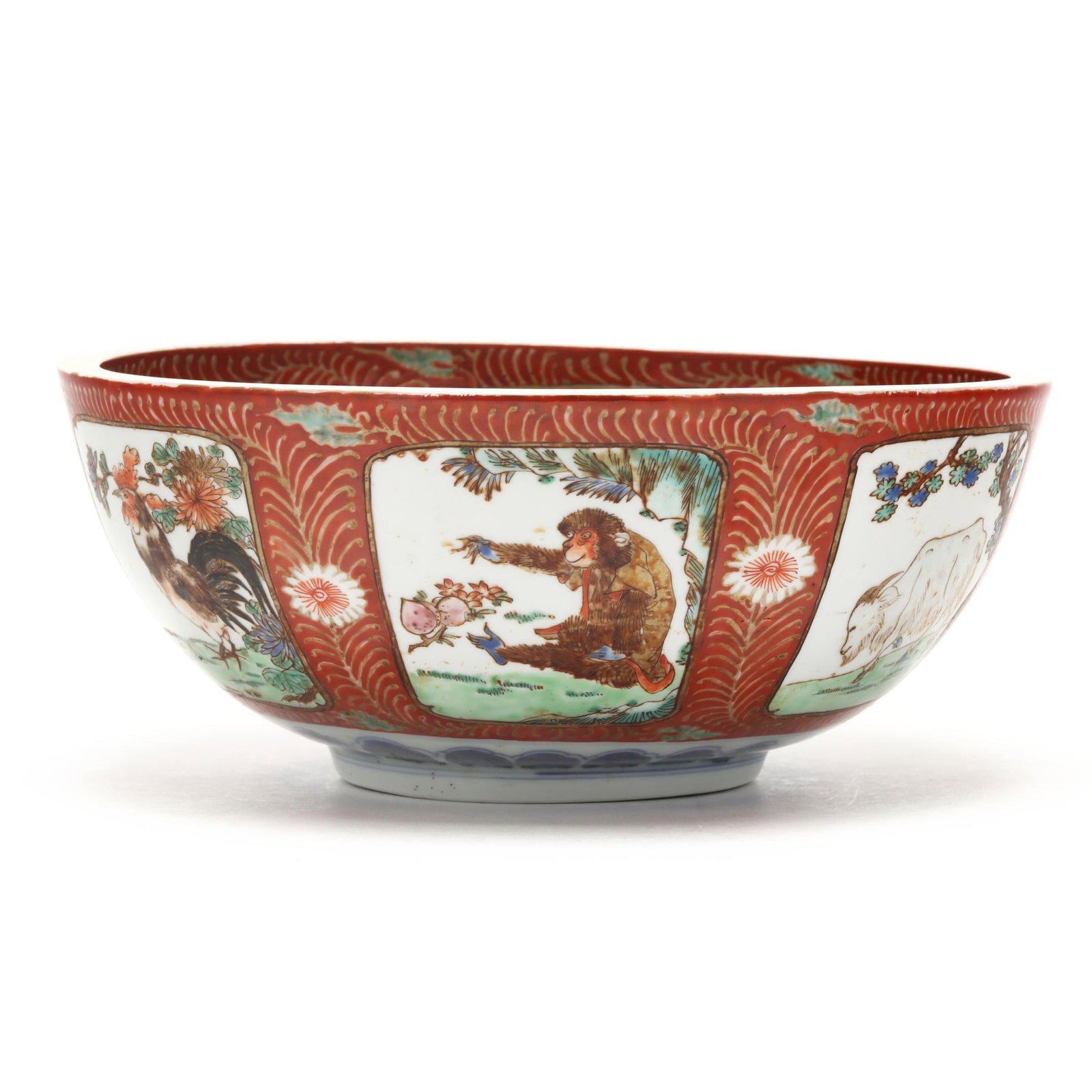 A Japanese Kutani Center Bowl with Twelve Lunar Zodiac Animals: A Japanese Kutani Center Bowl with Twelve Lunar Zodiac AnimalsMeiji period (1868-1912), porcelain hand-painted with shaped reserves each containing a finely detailed zodiac animal, six to the interior