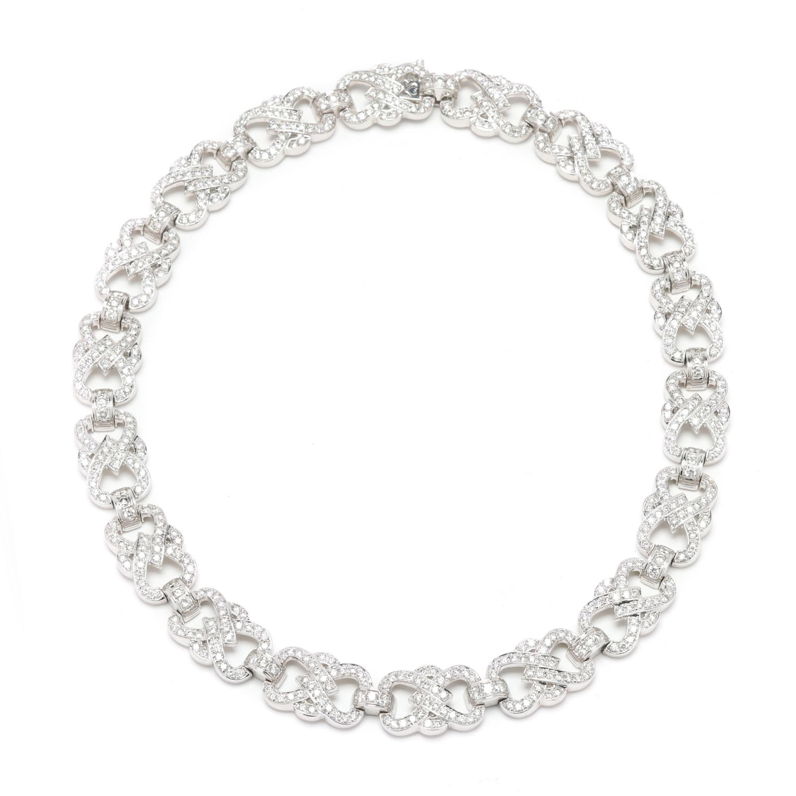 White Gold and Diamond Knot Motif Necklace: White Gold and Diamond Knot Motif Necklacethe necklace with repeating knot design links, set with full cut round diamonds weighing approximately 13.30 total carats (H-I color, SI1-SI2 clarity), comple