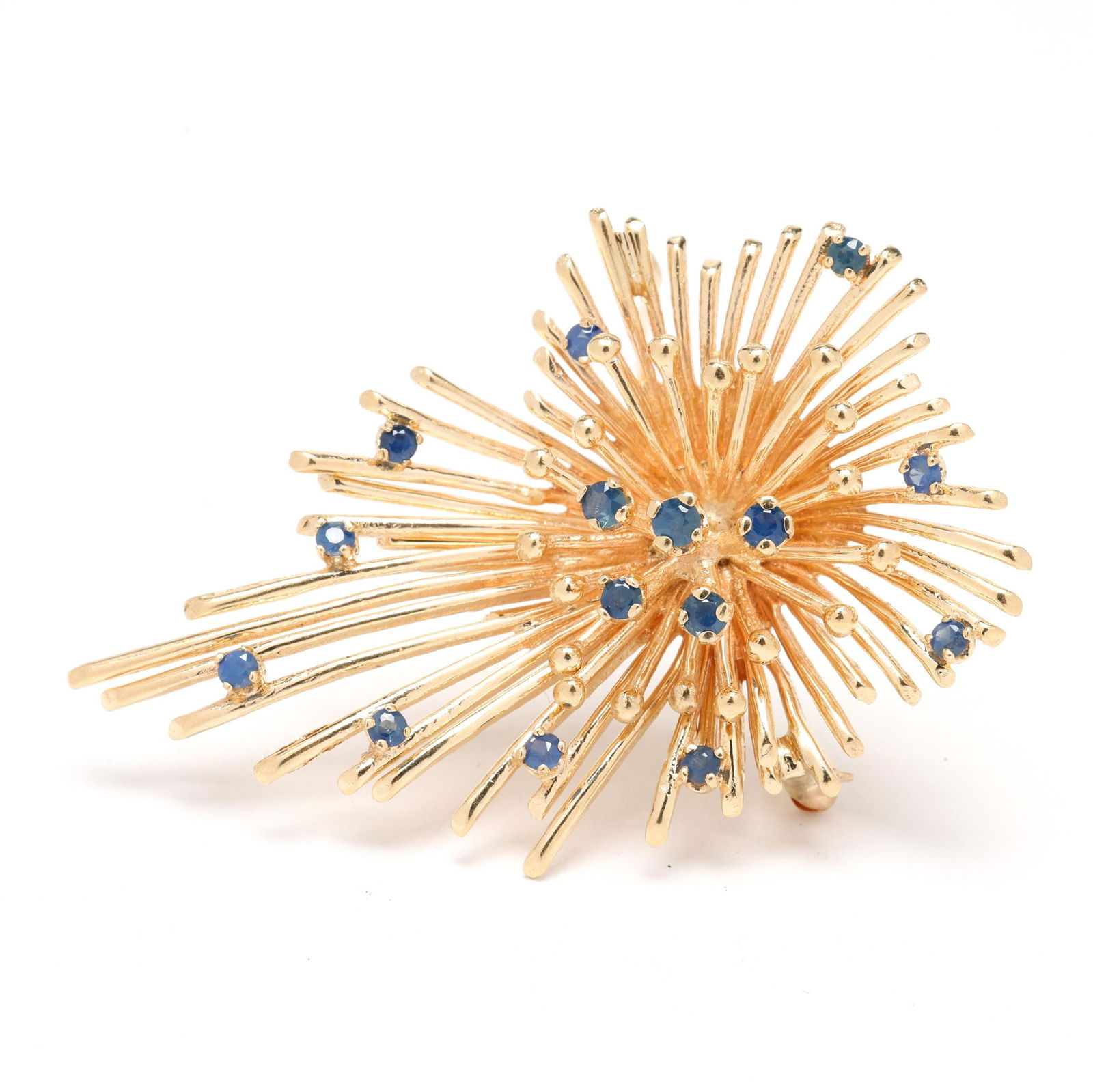 Vintage Gold and Sapphire Sunburst Brooch: Vintage Gold and Sapphire Sunburst Broochsunburst brooch, the rays interspersed with round cut sapphires, completed with a single locking pin stem, XRF testing 14KT. 2 1/8 x 1 3/8 in. 9.7 dwt. Additi