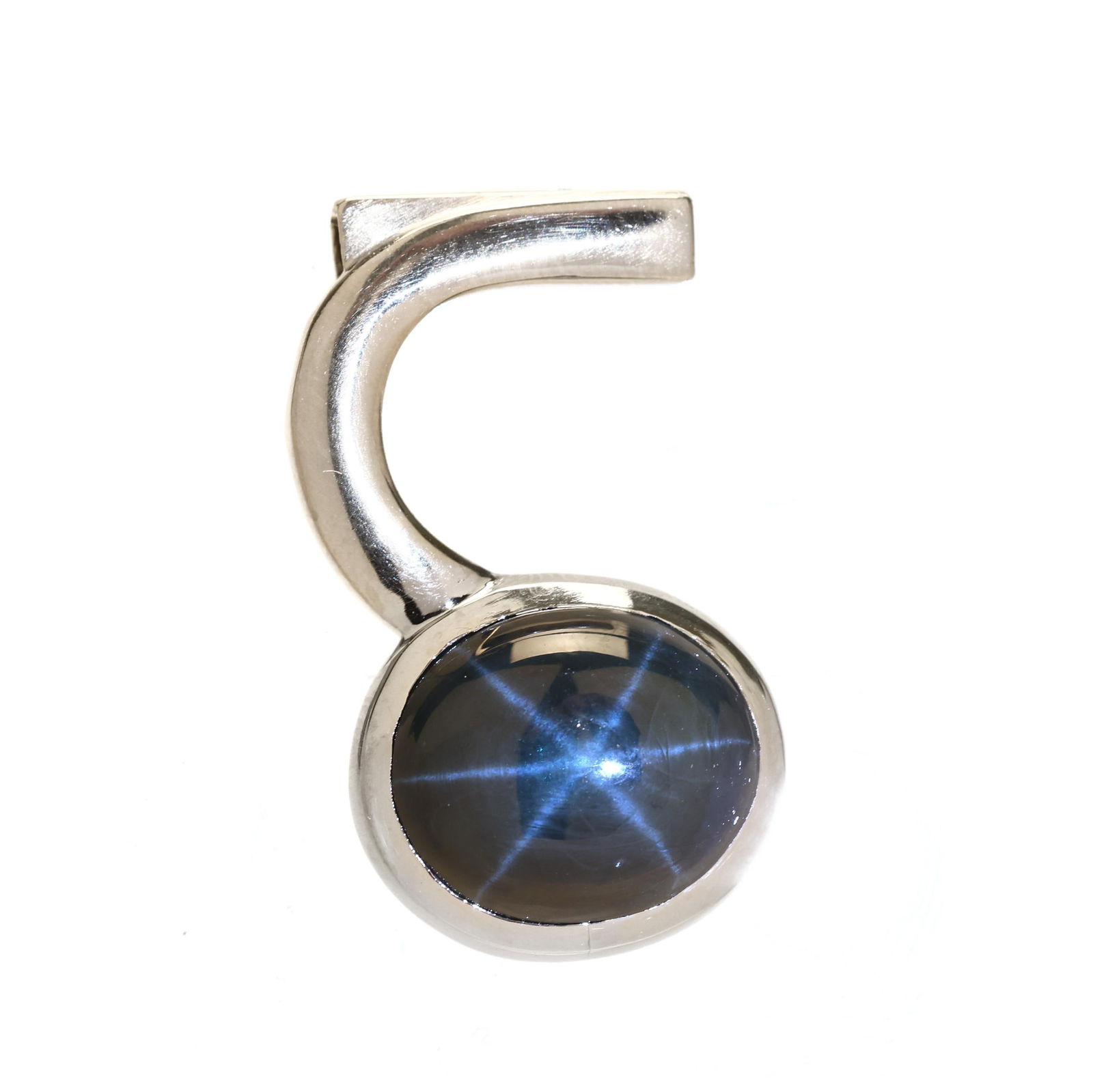 Platinum and Star Sapphire Pendant, Tony Nemyer for Jewelsmith: Platinum and Star Sapphire Pendant, Tony Nemyer for Jewelsmiththe custom platinum pendant with bezel set oval cabochon cut star sapphire (15.32 x 13.06 x 6.67mm) weighing approximately 15.00 carats, c