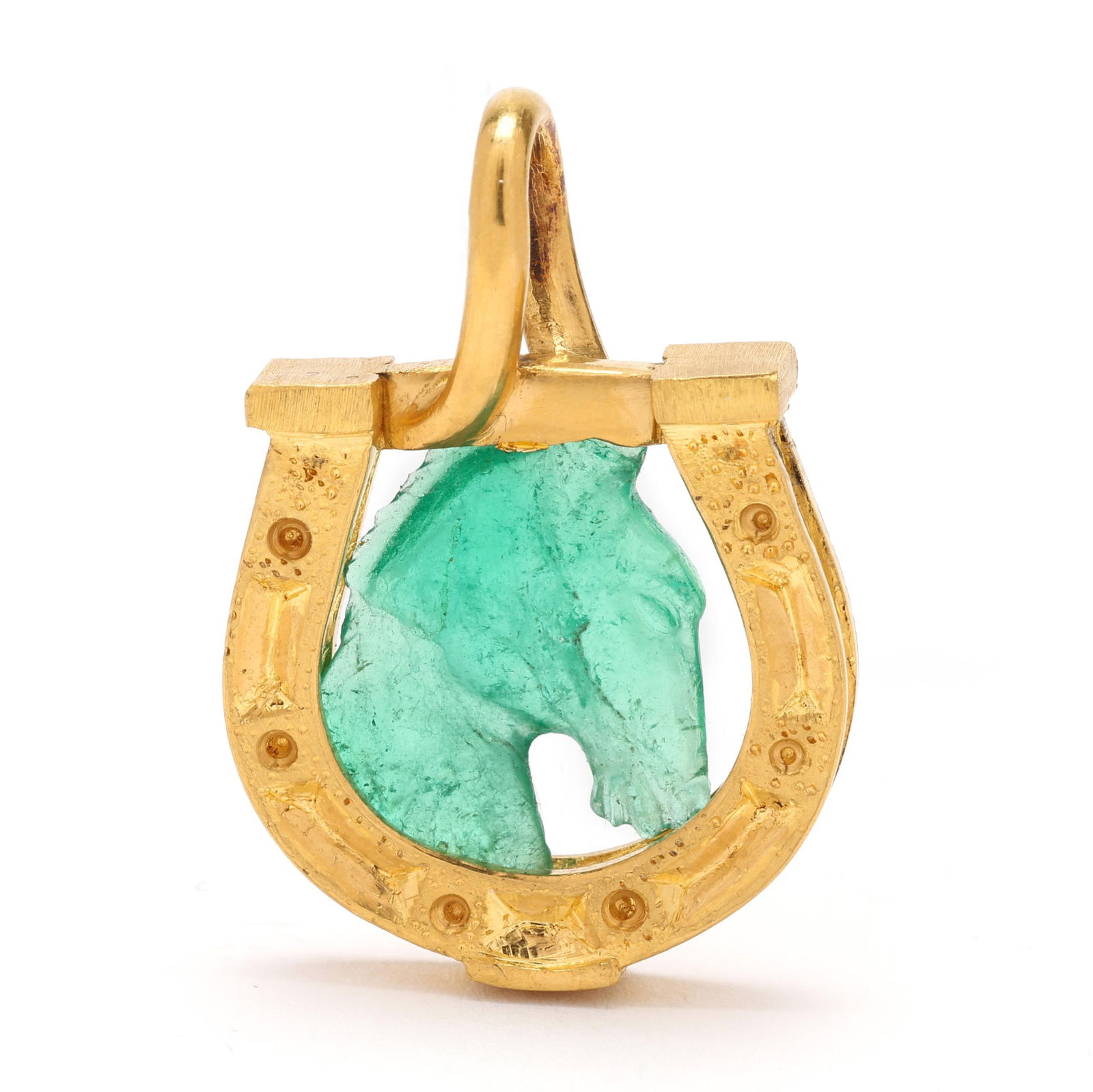 High Karat Gold and Carved Emerald Equestrian Motif Pendant, Tony Nemyer for Jewelsmith: High Karat Gold and Carved Emerald Equestrian Motif Pendant, Tony Nemyer for Jewelsmiththe horseshoe motif pendant with hand-wrought details set to the center with an emerald, finely carved to both si