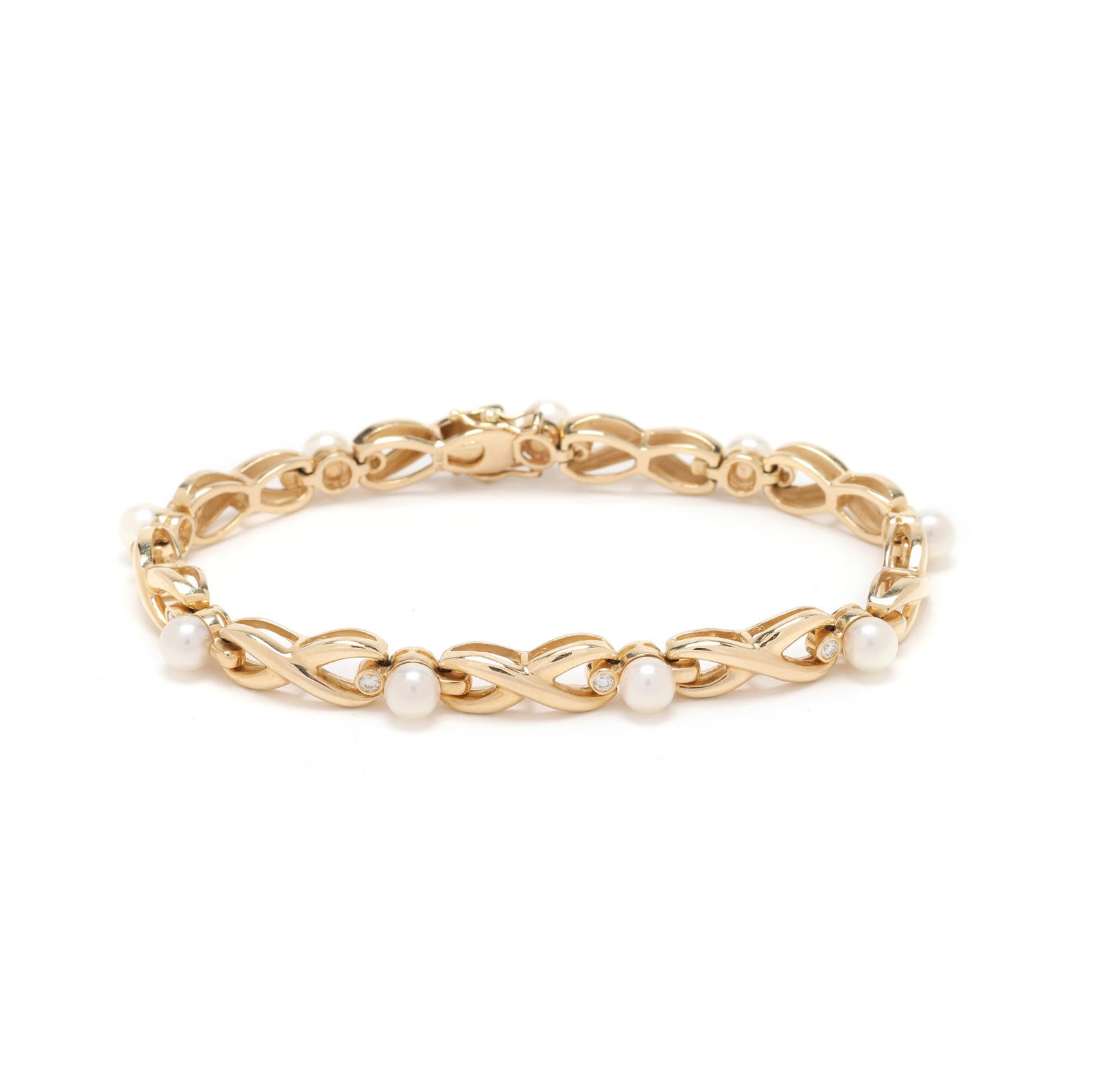Gold, Pearl, and Diamond XO Motif Bracelet (1 of 5)