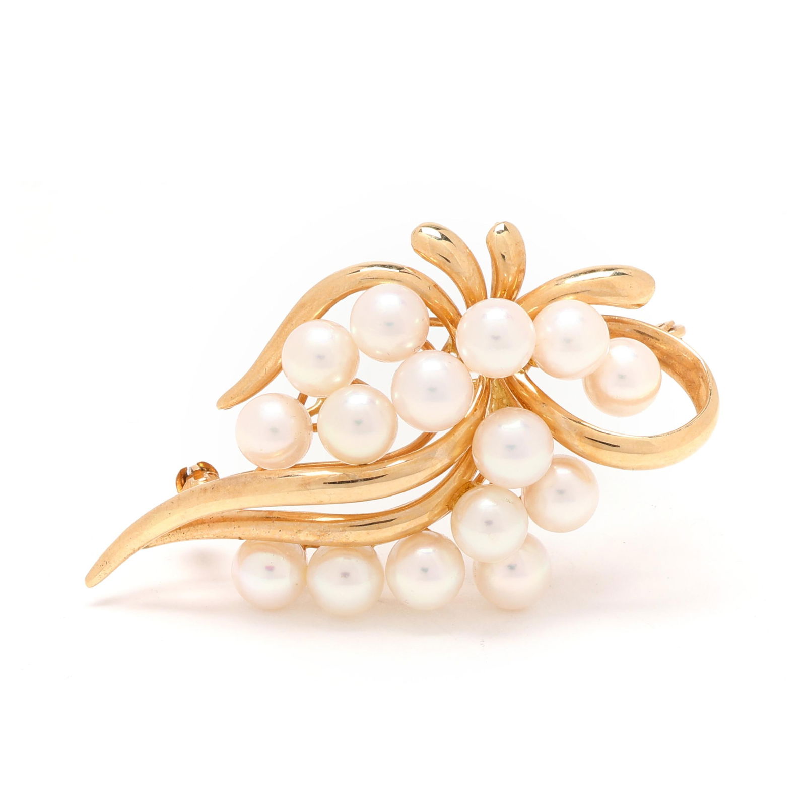Gold and Pearl Cluster Brooch, Gump's: Gold and Pearl Cluster Brooch, Gump'sthe gold ribbon brooch set with round cultured pearls (5.5 - 6.0mm), completed with a single locking pin stem, signed and stamped 14K. 1 x 2 in. 7.6 dwt. Pearls di