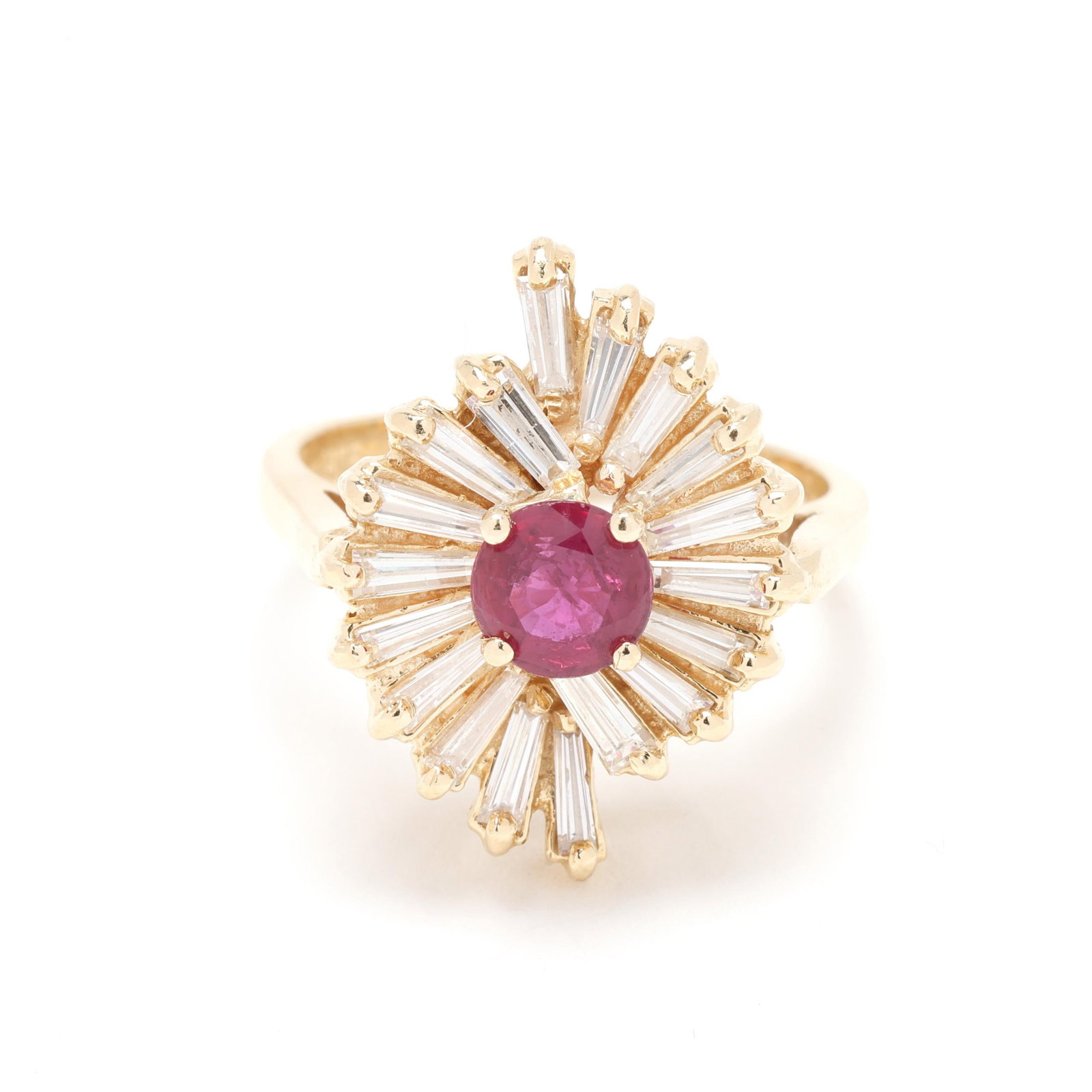 Gold, Ruby, and Diamond Cocktail Ring: Gold, Ruby, and Diamond Cocktail Ring centered on a round cut ruby (5.5 - 5.6 x 3mm) weighing approximately .60 carat within a surround of baguette cut diamonds weighing approximately 1.0 total