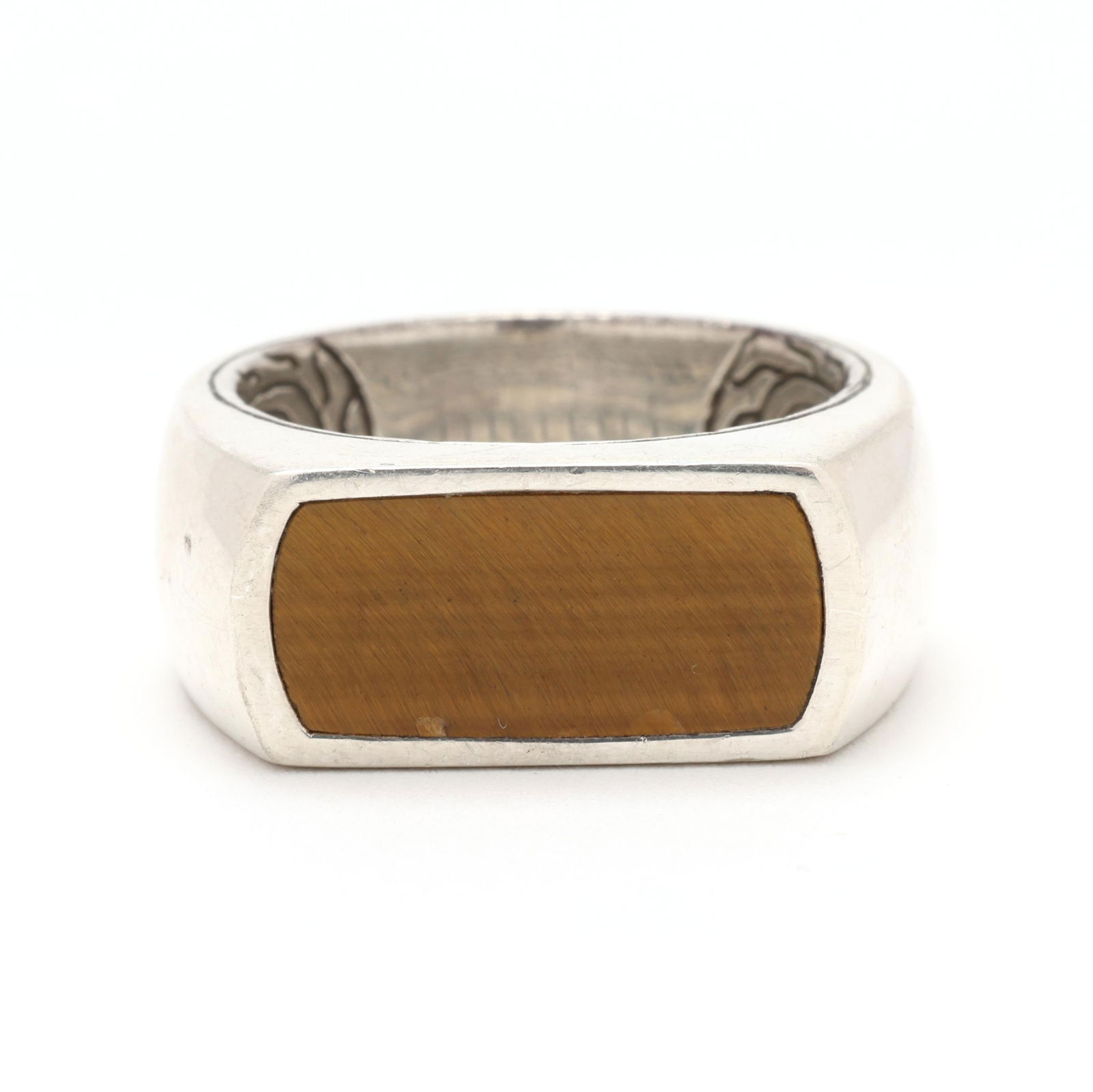 Silver and Tiger's Eye Quartz Ring, John Hardy: Silver and Tiger's Eye Quartz Ring, John Hardyhotizontally inlaid with a tablet cut tiger's eye quartz, signed and stamped 925. 10 x 21mm; Ring size 10 0.590 troy oz. Additional high-resolution photo