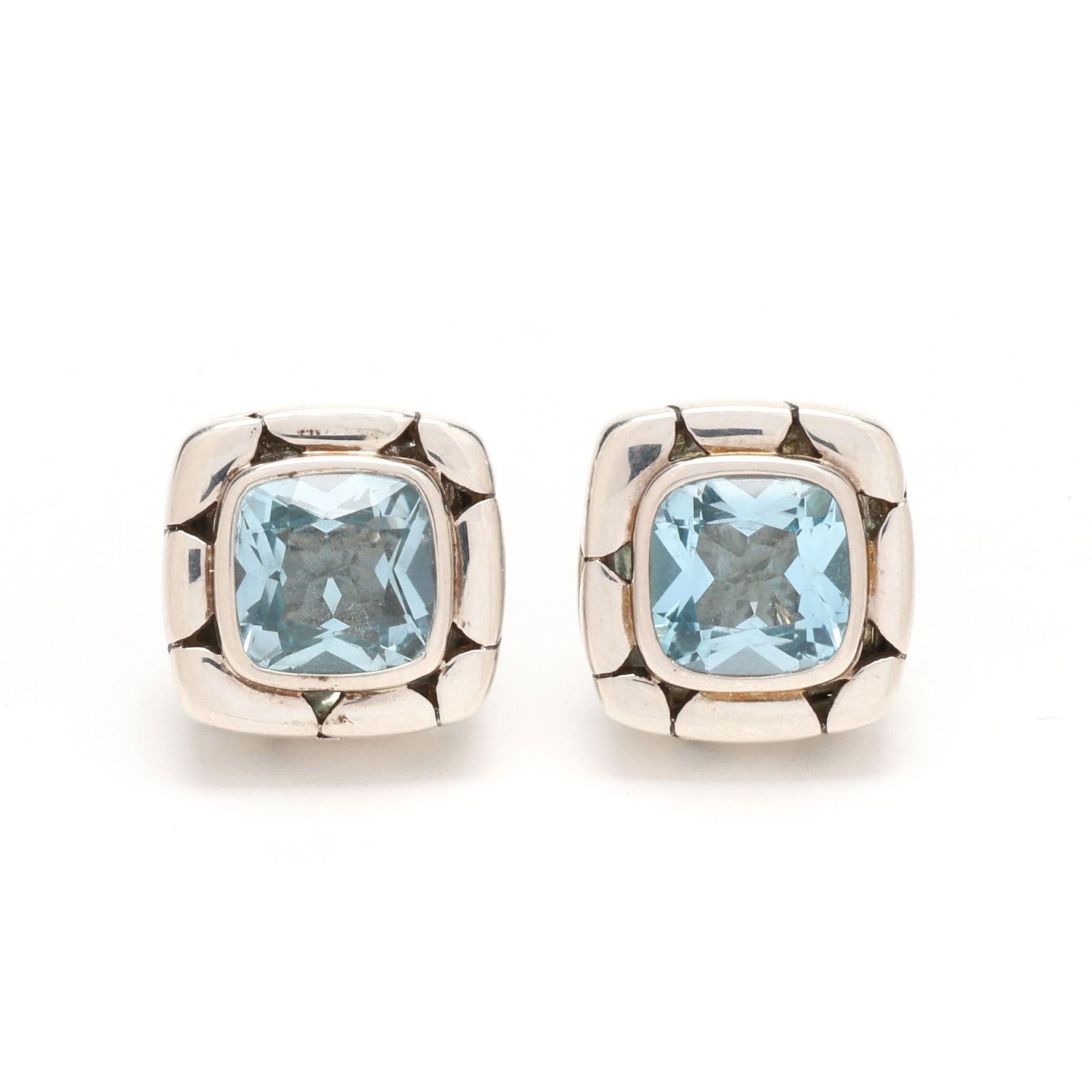 Silver and Blue Topaz Kali Stud Earrings, John Hardy: Silver and Blue Topaz Kali Stud Earrings, John Hardyfrom the Kali collection, centered on a bezel set cushion cut blue topaz within a silver surround, completed with a post and friction back, signed a